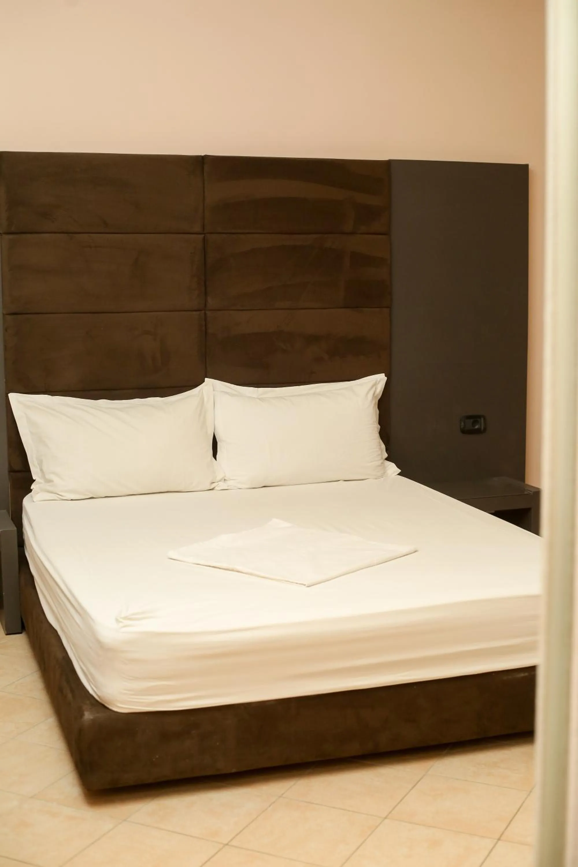 Bed in Aliko Hotel