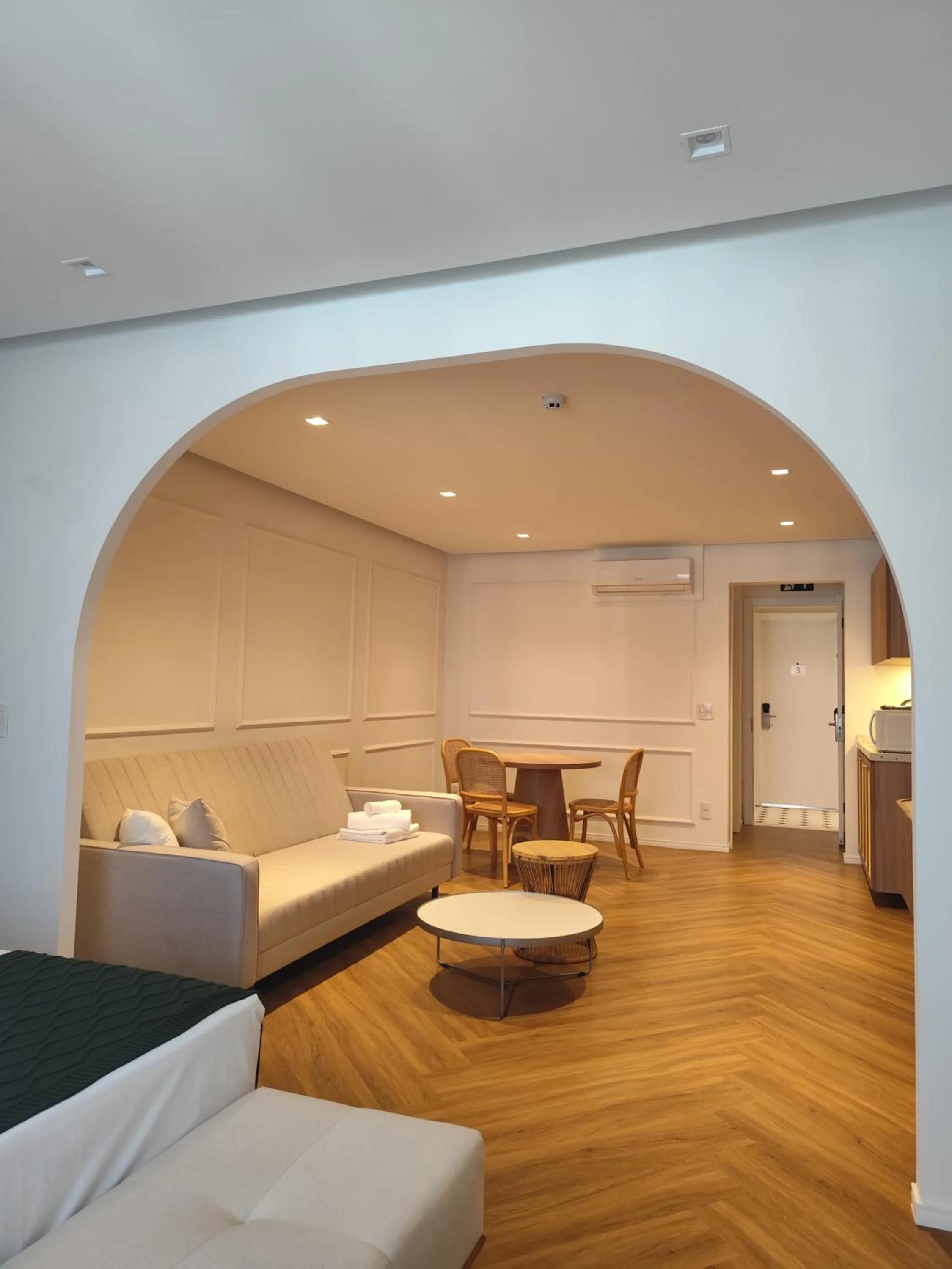 Living room, Bed in Santé Vivre L'Experience by Livá OFICIAL