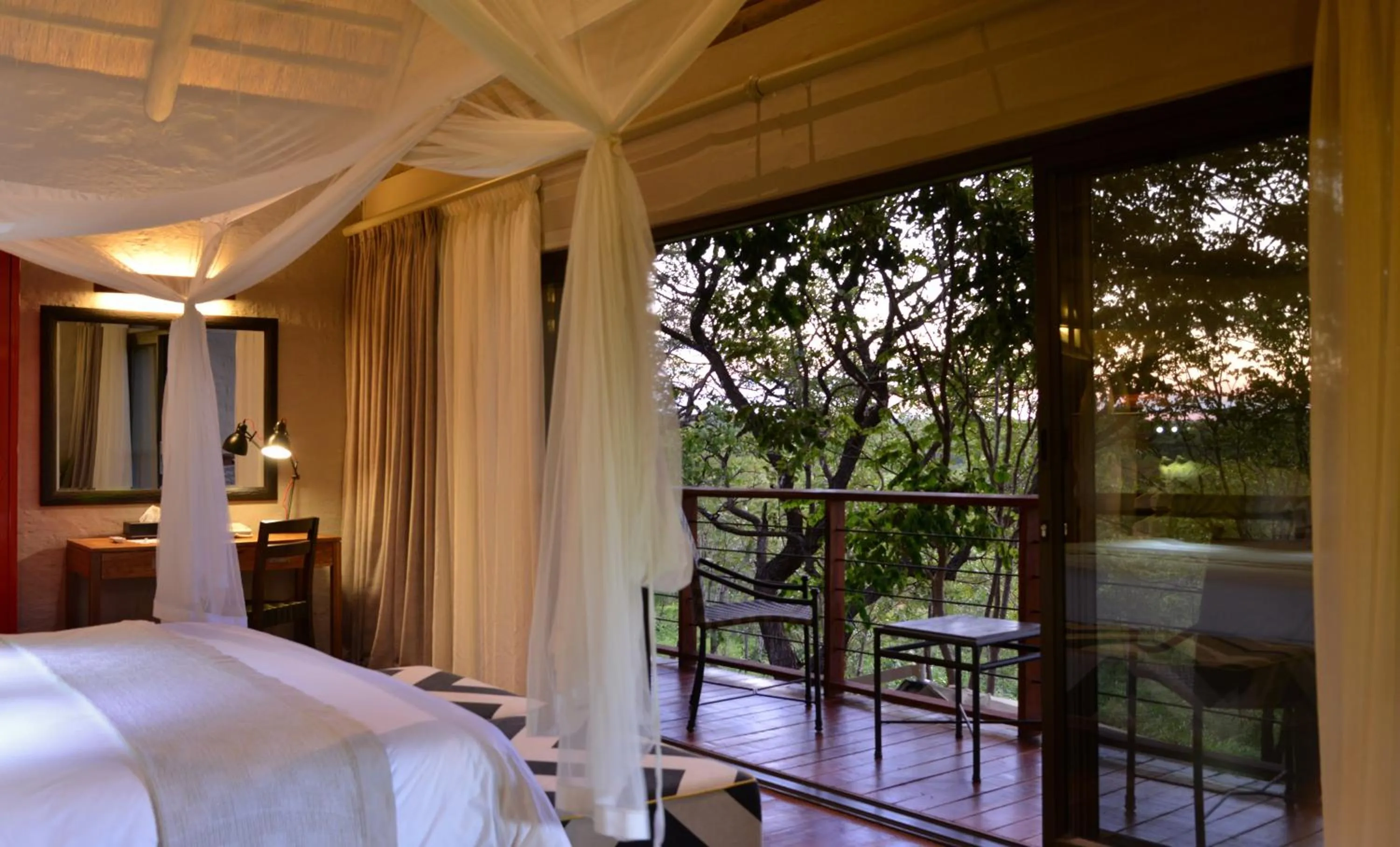 Balcony/Terrace, Bed in Victoria Falls Safari Suites