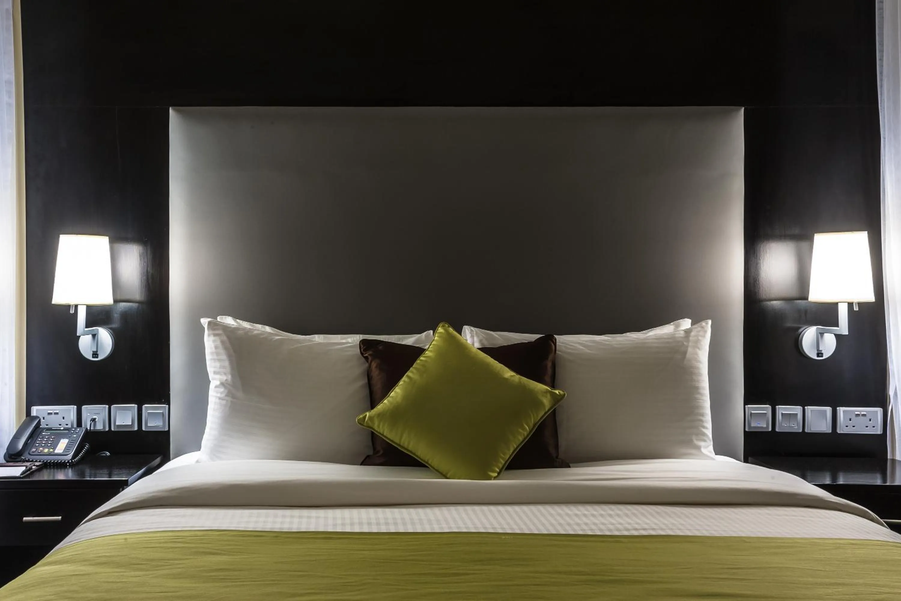 Bed in Acacia Premier Hotel