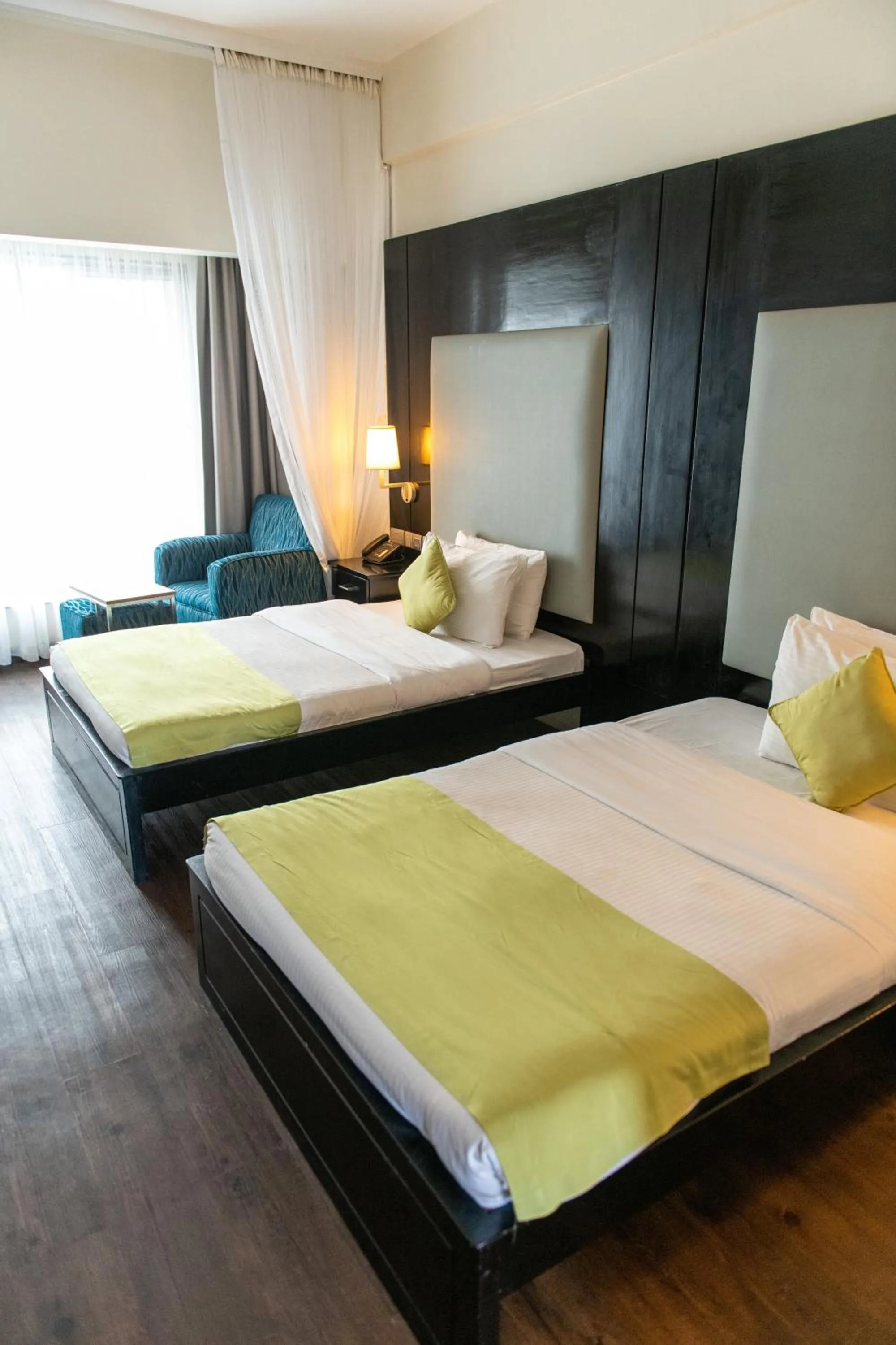 Bed in Acacia Premier Hotel