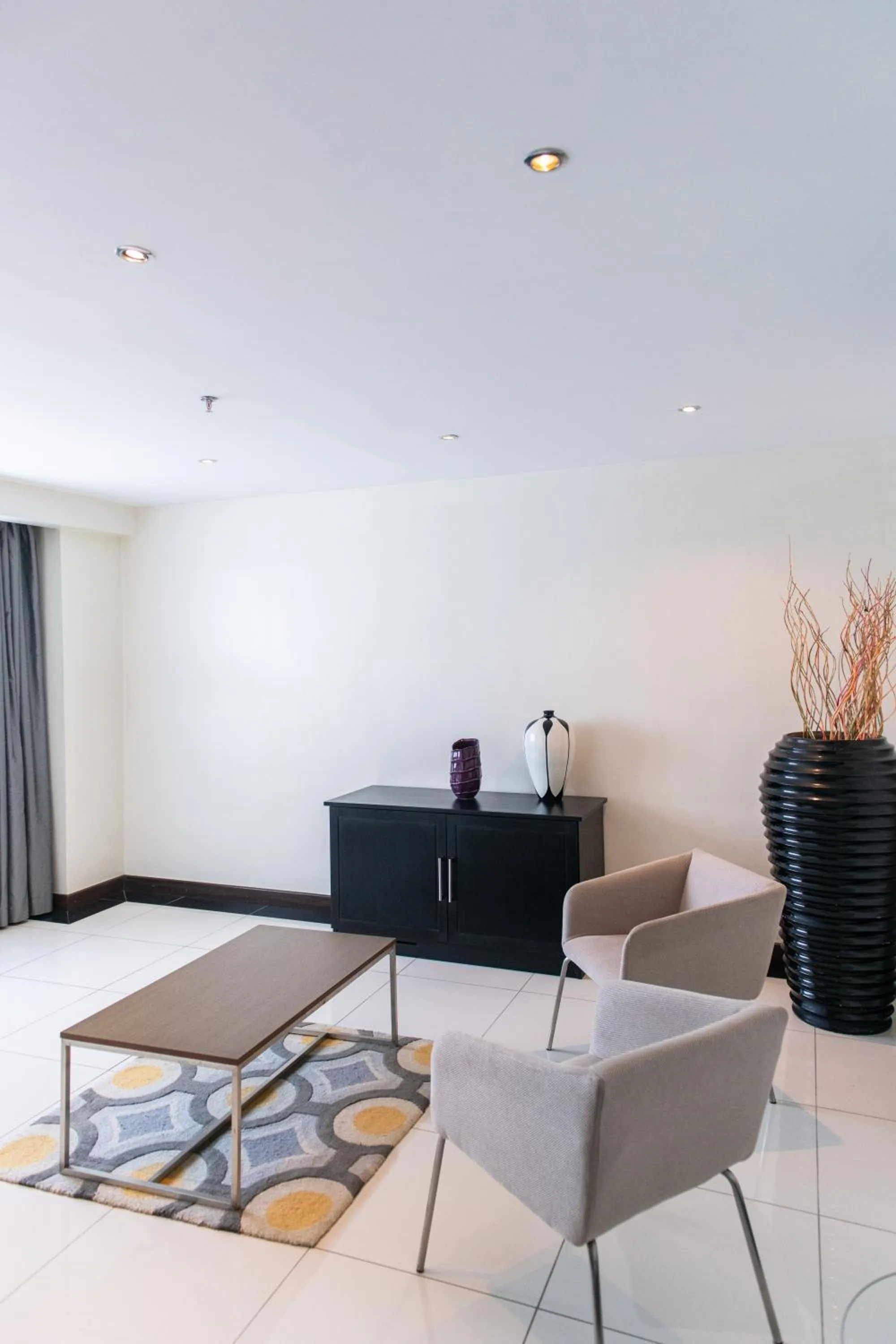 Seating area in Acacia Premier Hotel