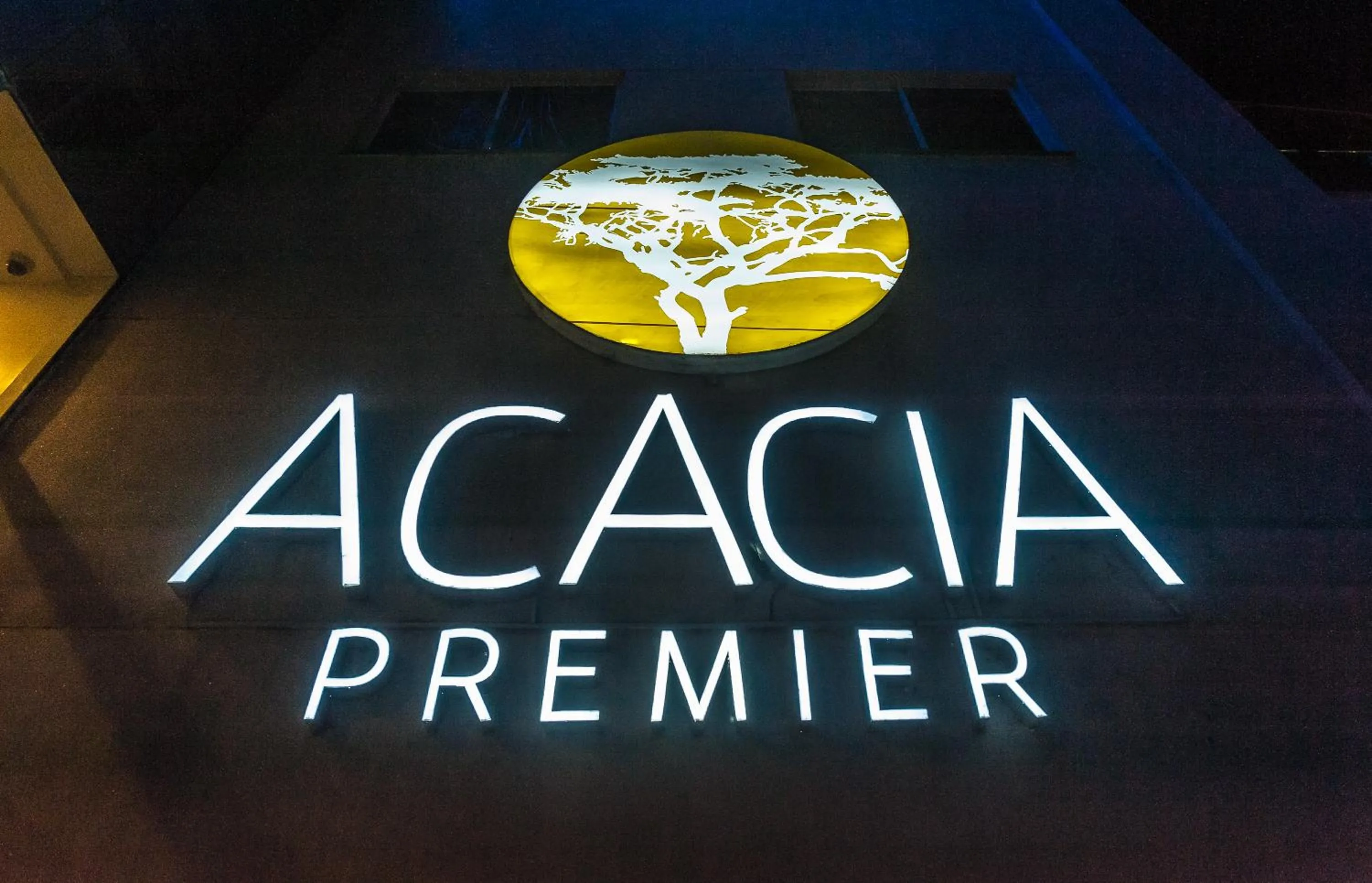 Property logo or sign in Acacia Premier Hotel