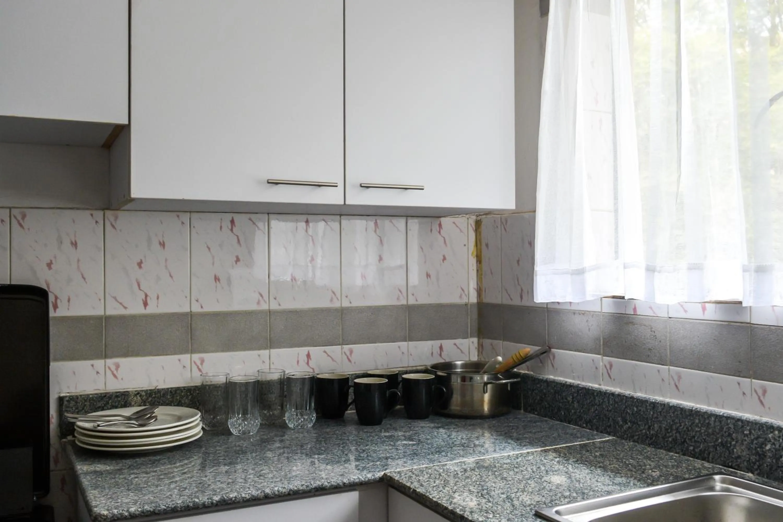 Kitchen or kitchenette in Brickwood Apartments