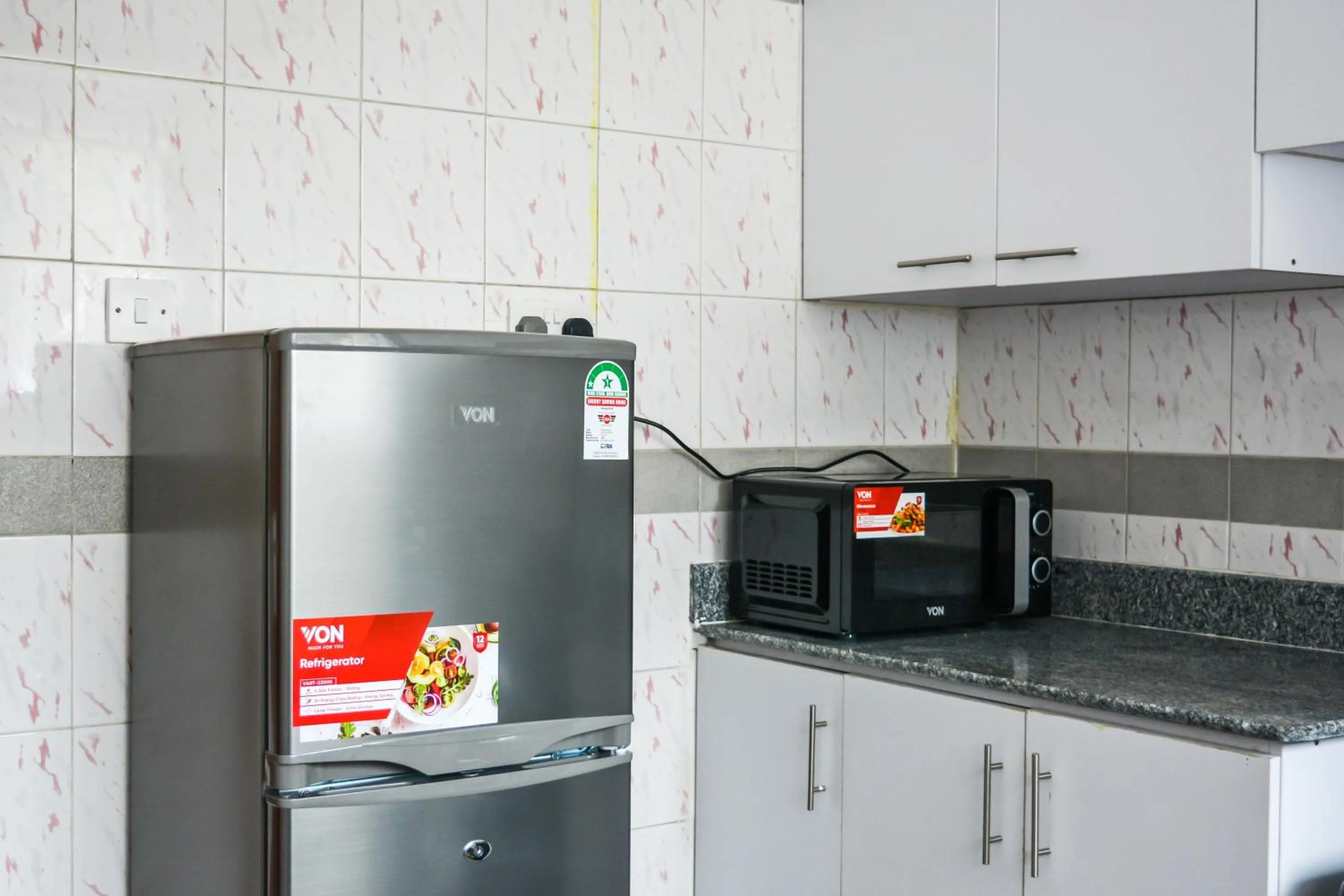 Kitchen or kitchenette in Brickwood Apartments