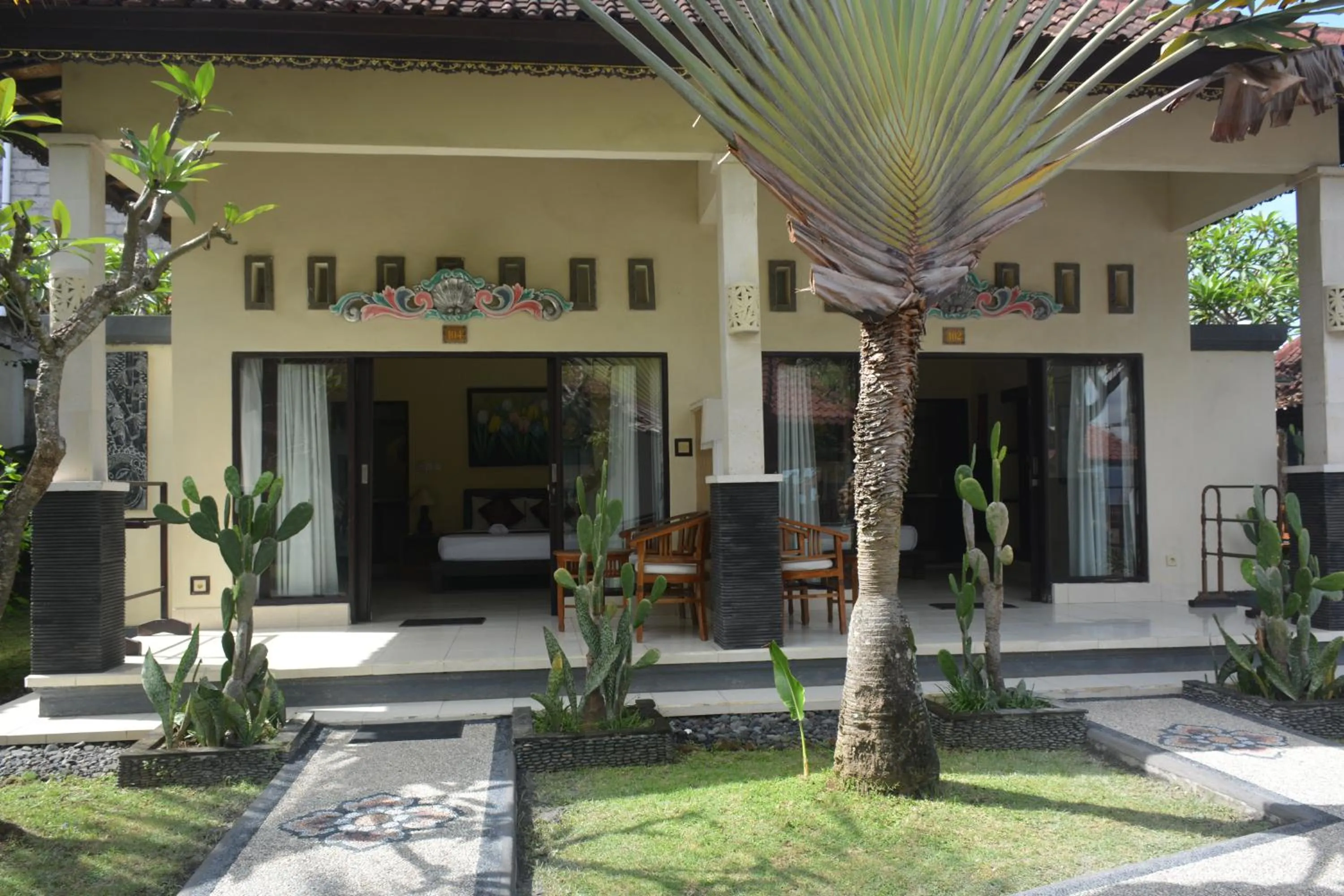 Bedroom in Segara Wangi Beach Cottages