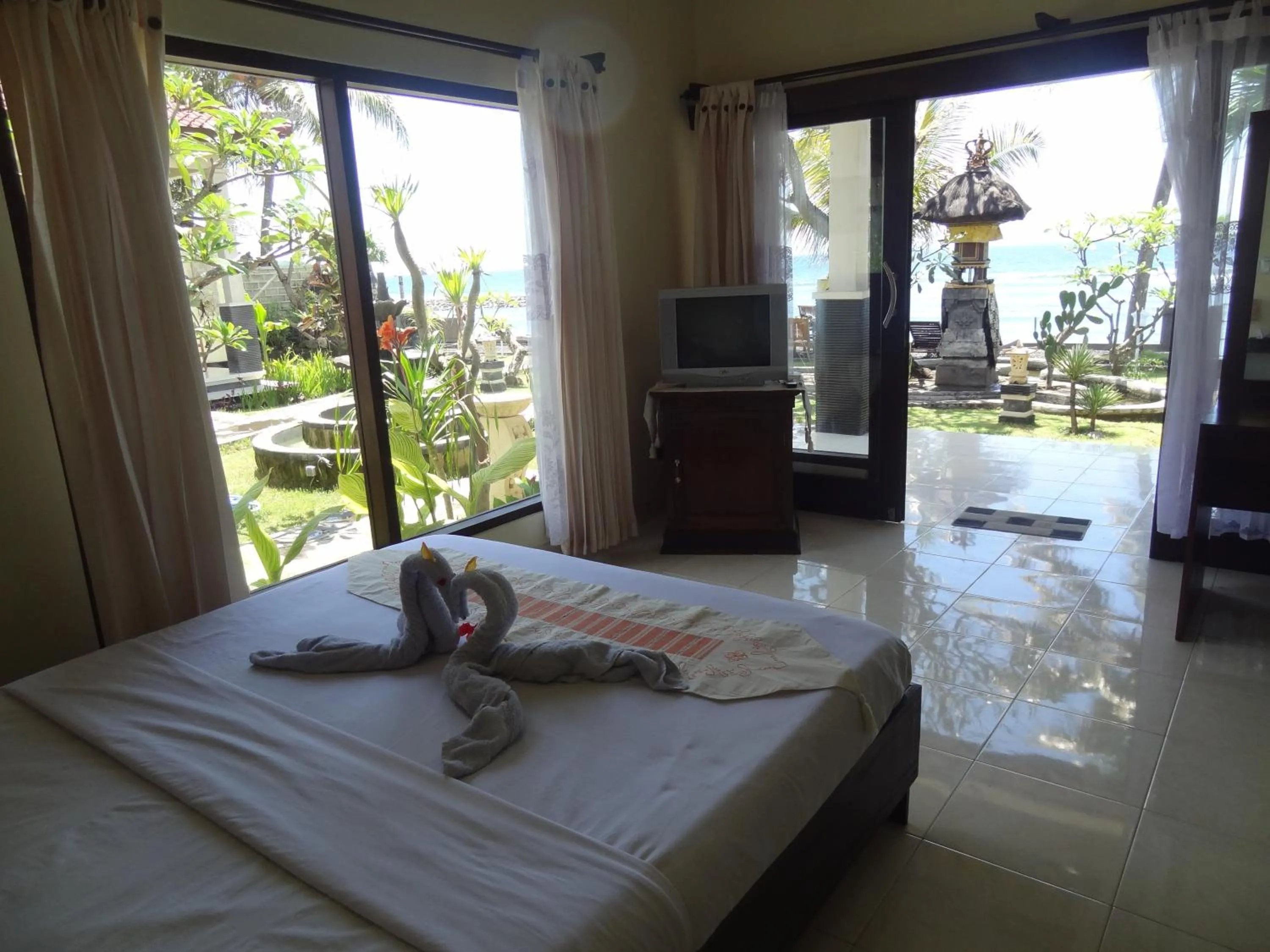 Photo of the whole room, Bed in Segara Wangi Beach Cottages