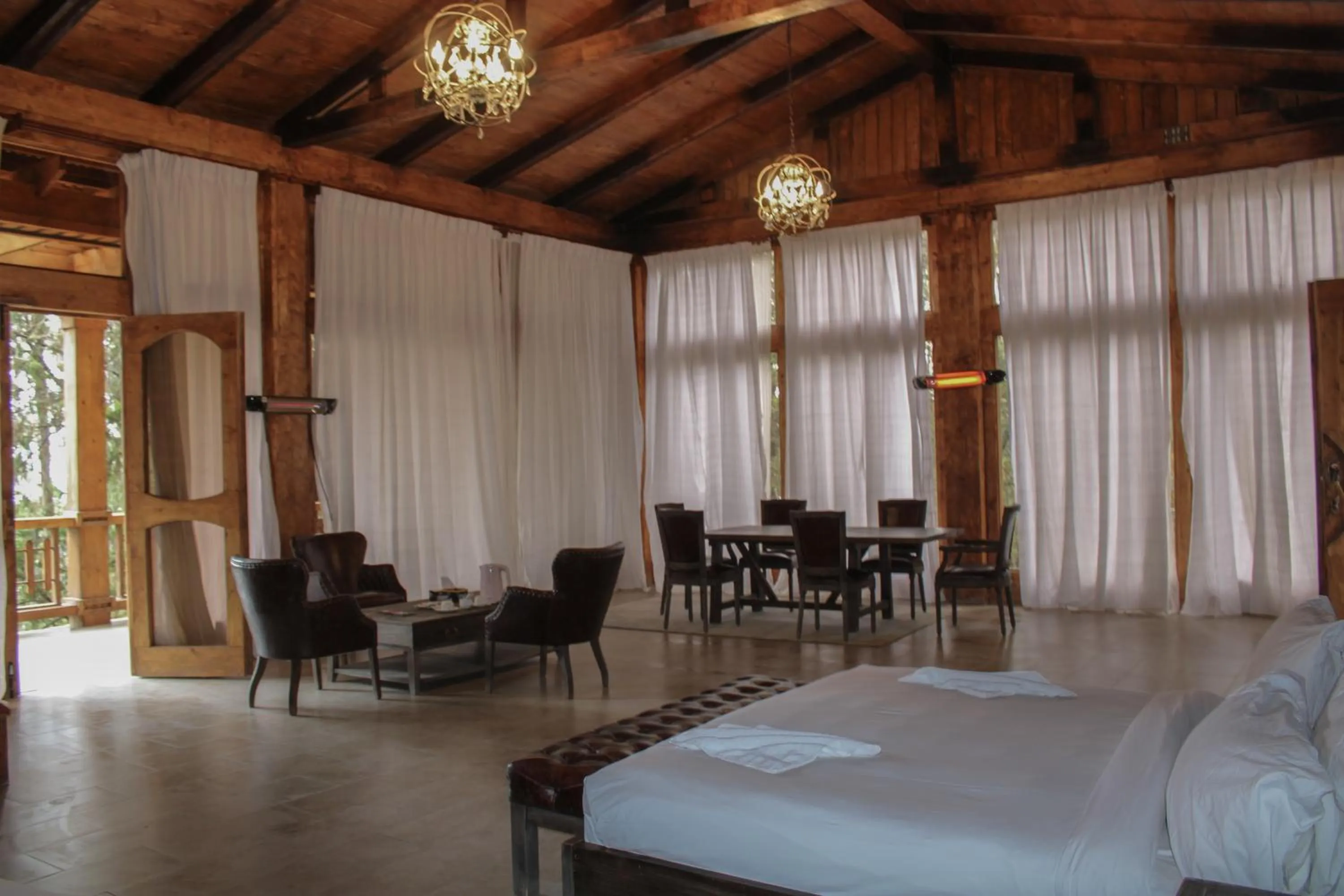 Seating area, Bed in Kuriftu Entoto Adventure Park