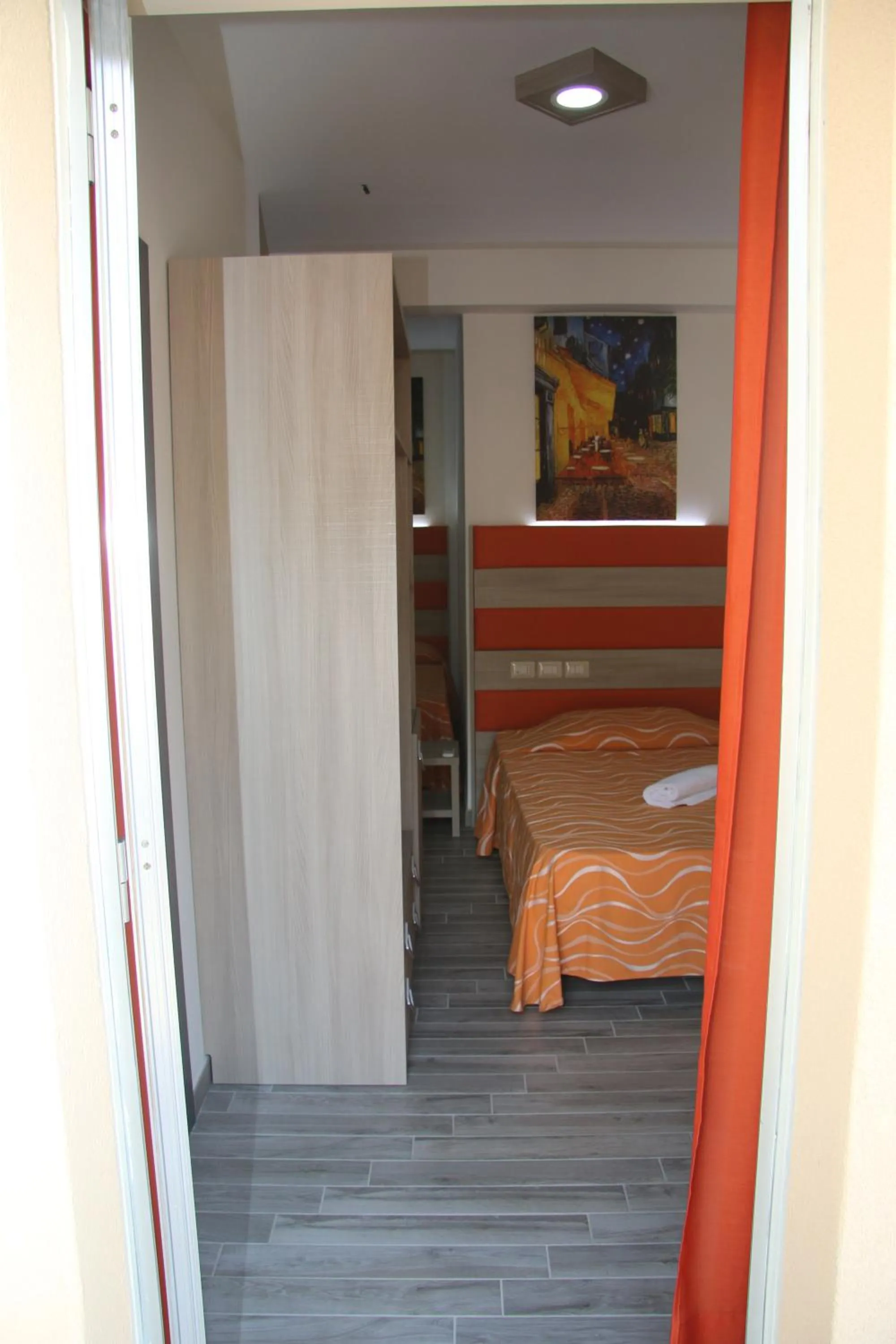 Bed in ChrisMare Hotel