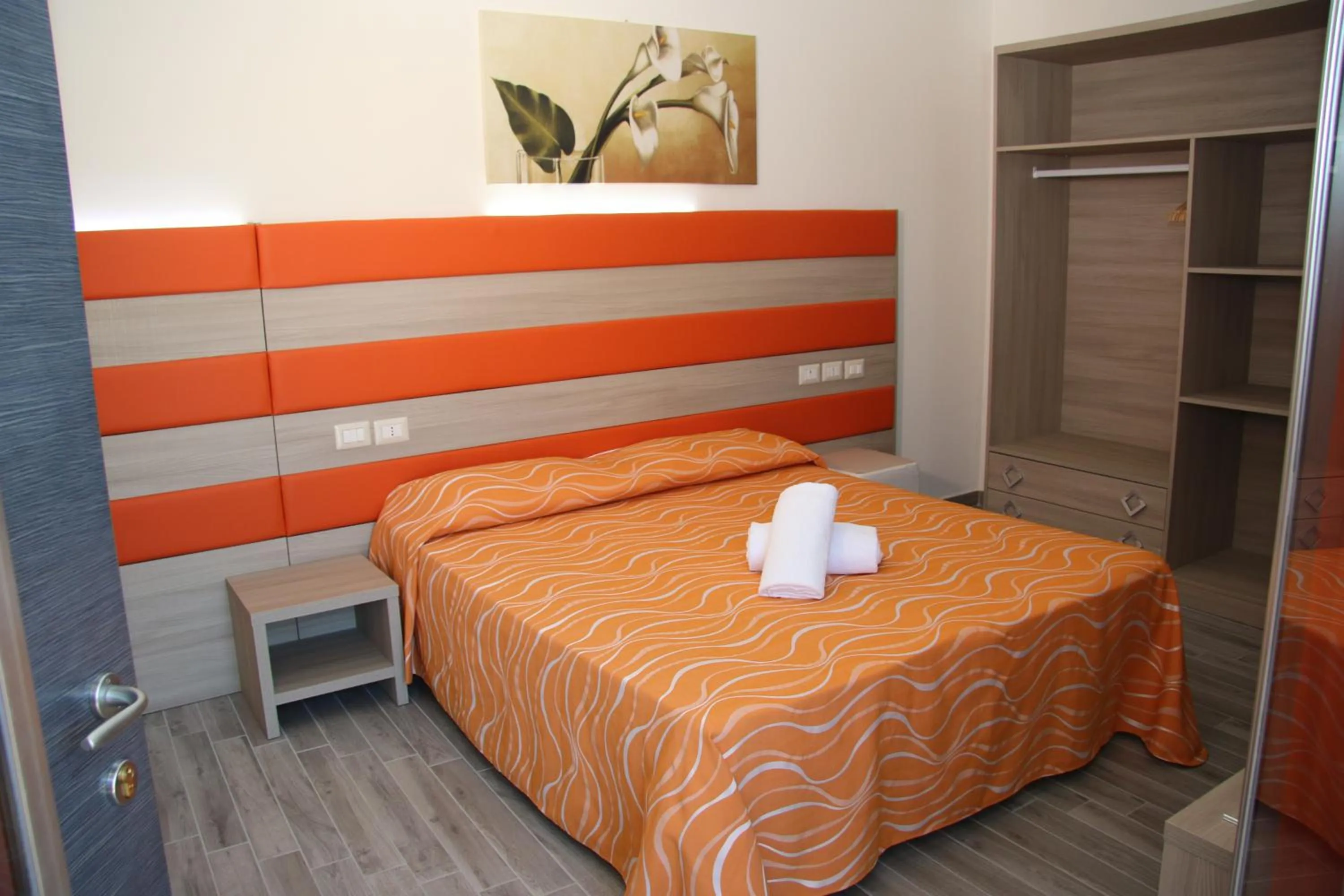 Bed in ChrisMare Hotel