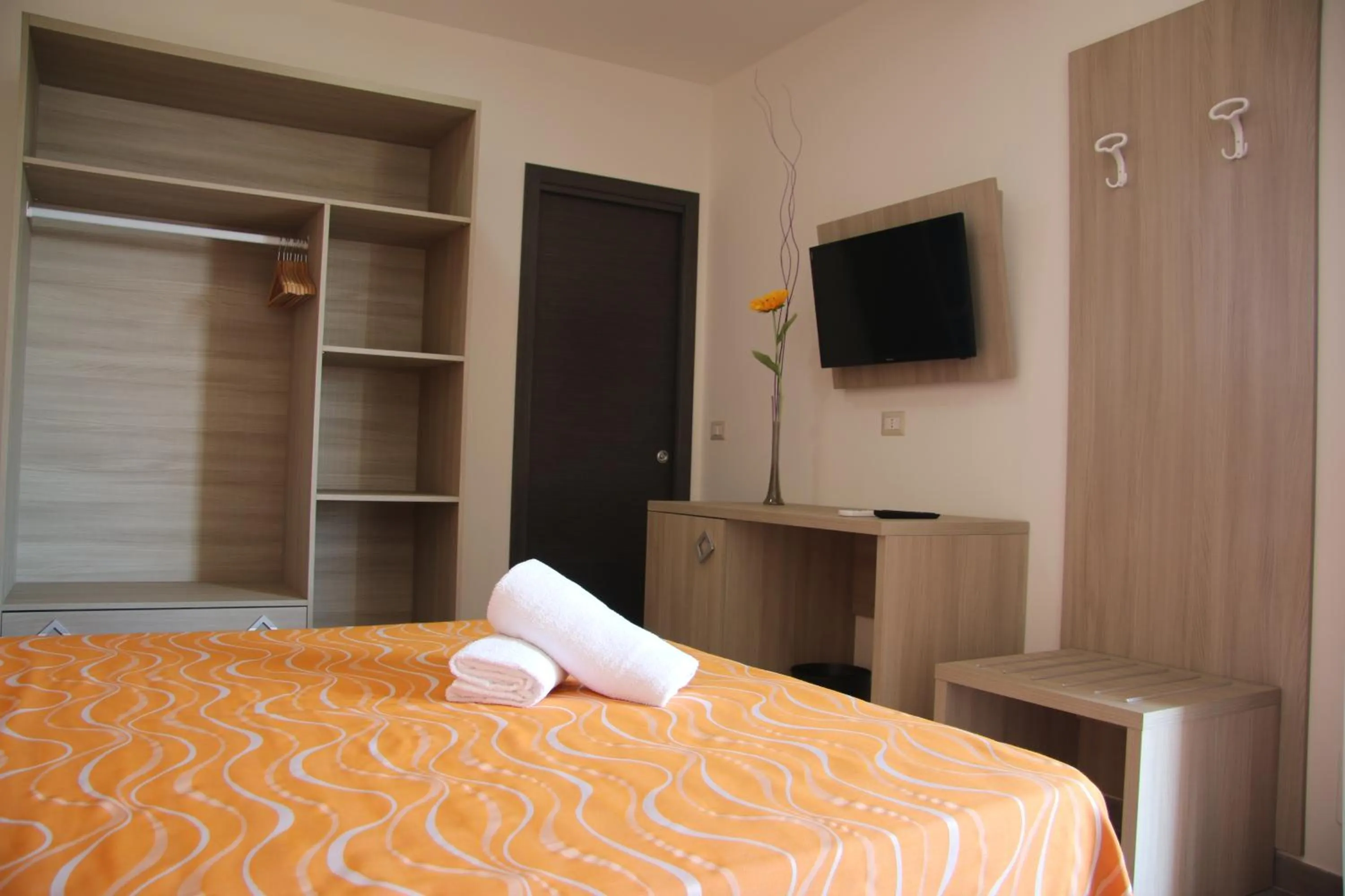 Bed in ChrisMare Hotel