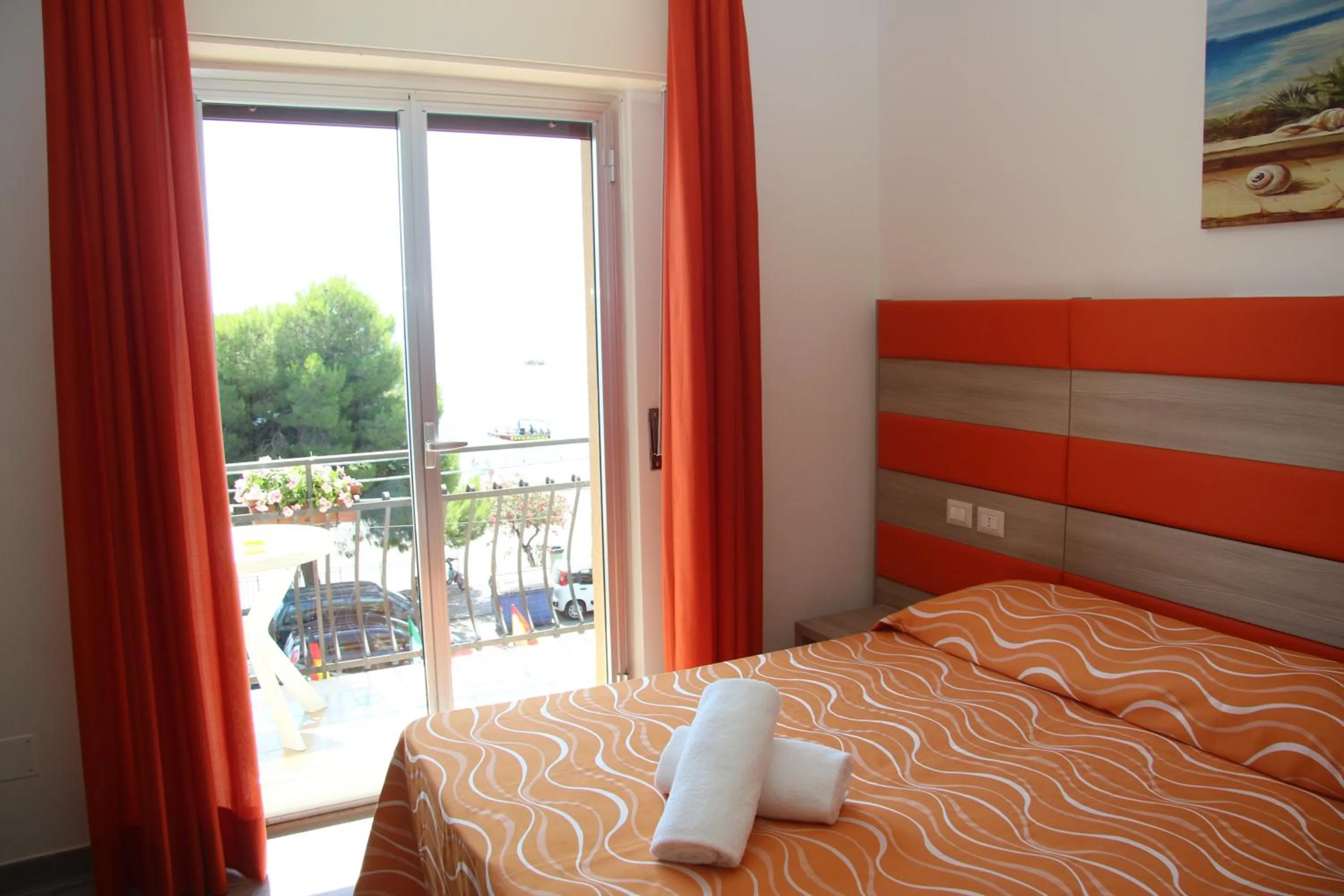 Bed in ChrisMare Hotel