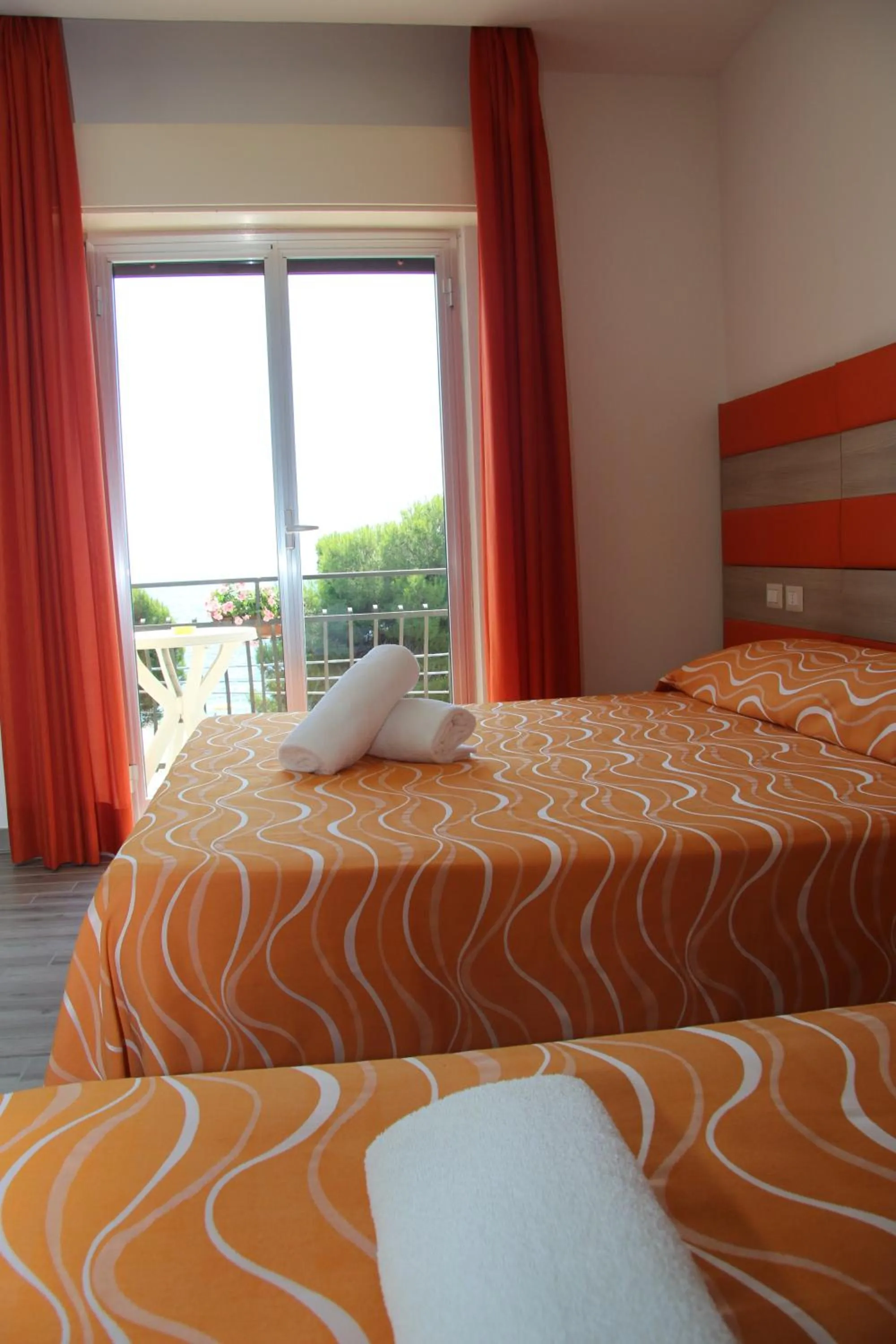 Bed in ChrisMare Hotel