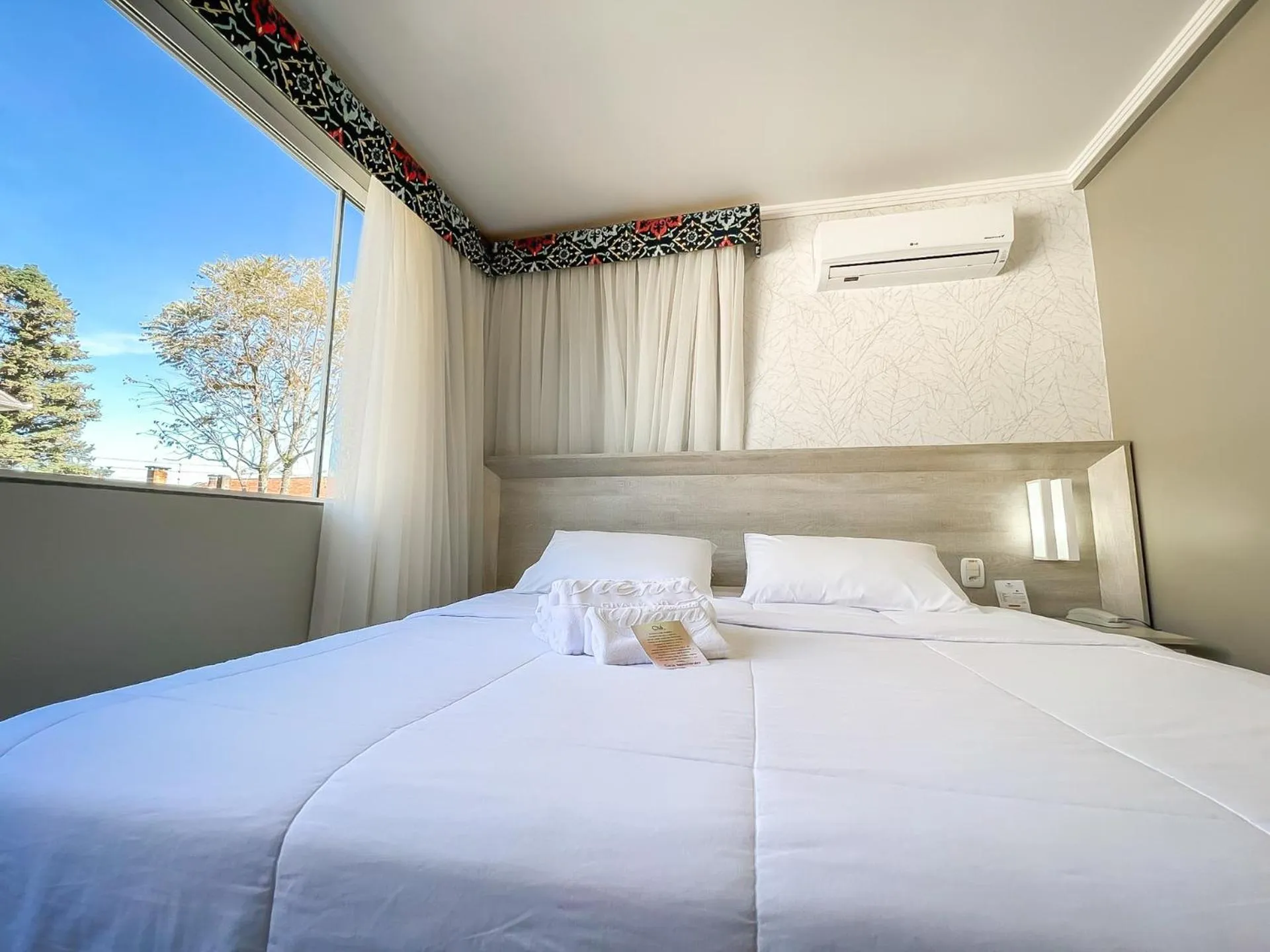 Bed in Pousada Viena