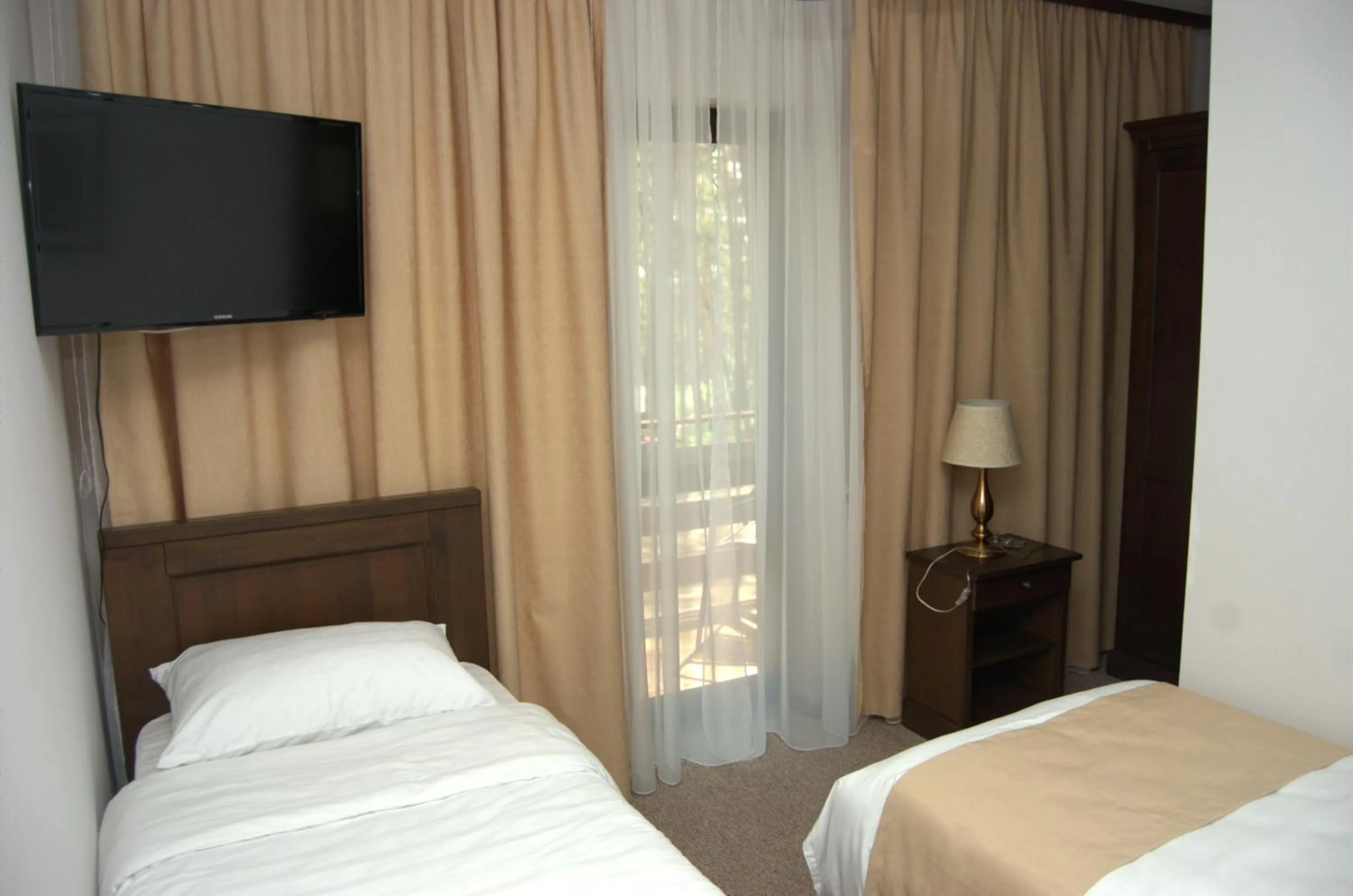 Photo of the whole room, Bed in Complex Parc Pini Moinesti