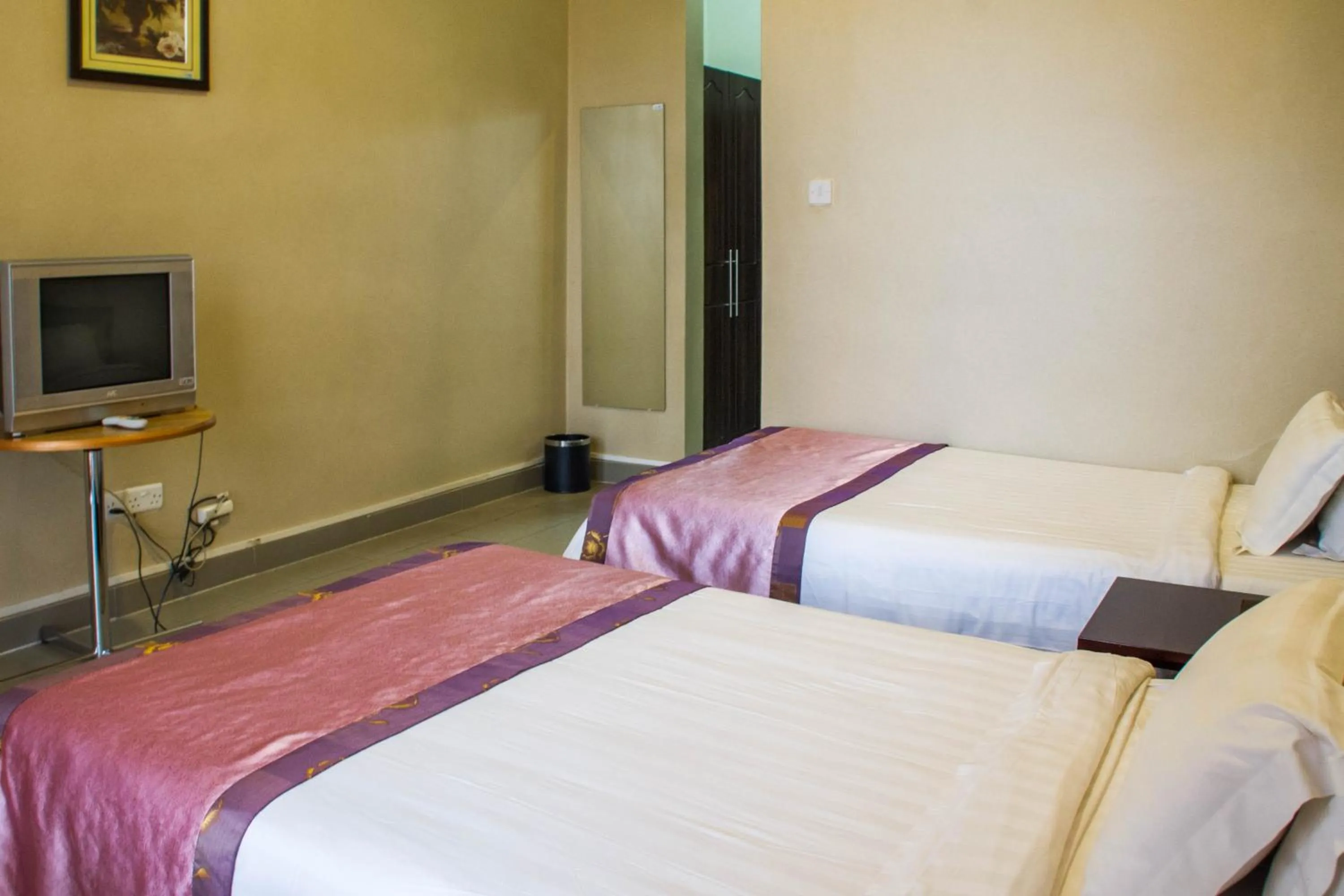 Bed in Lake View Resort Hotel