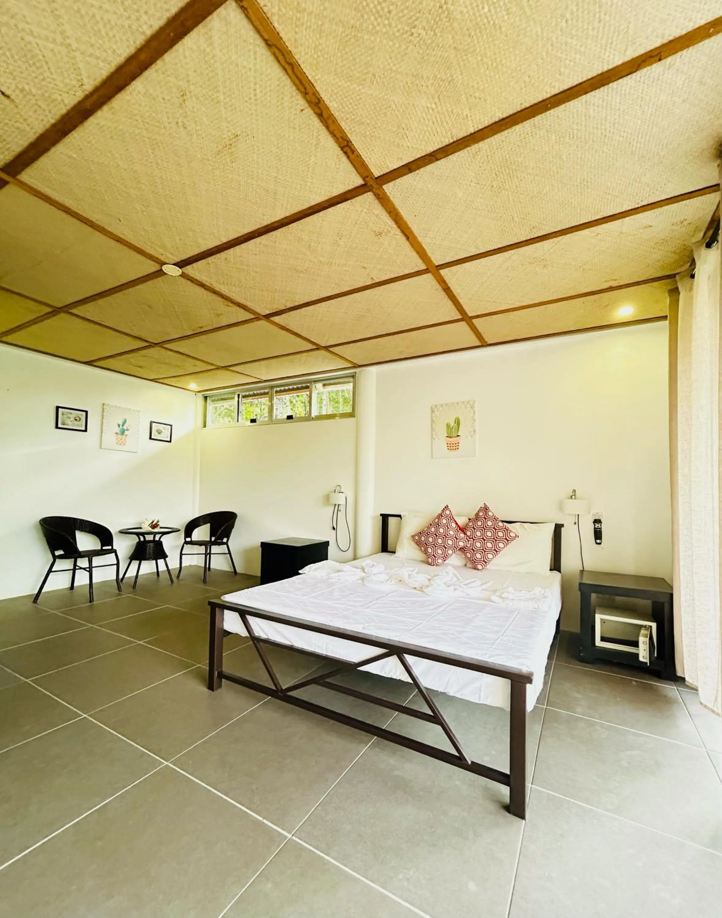 Bed in Chindonan Dive and Beach Resort