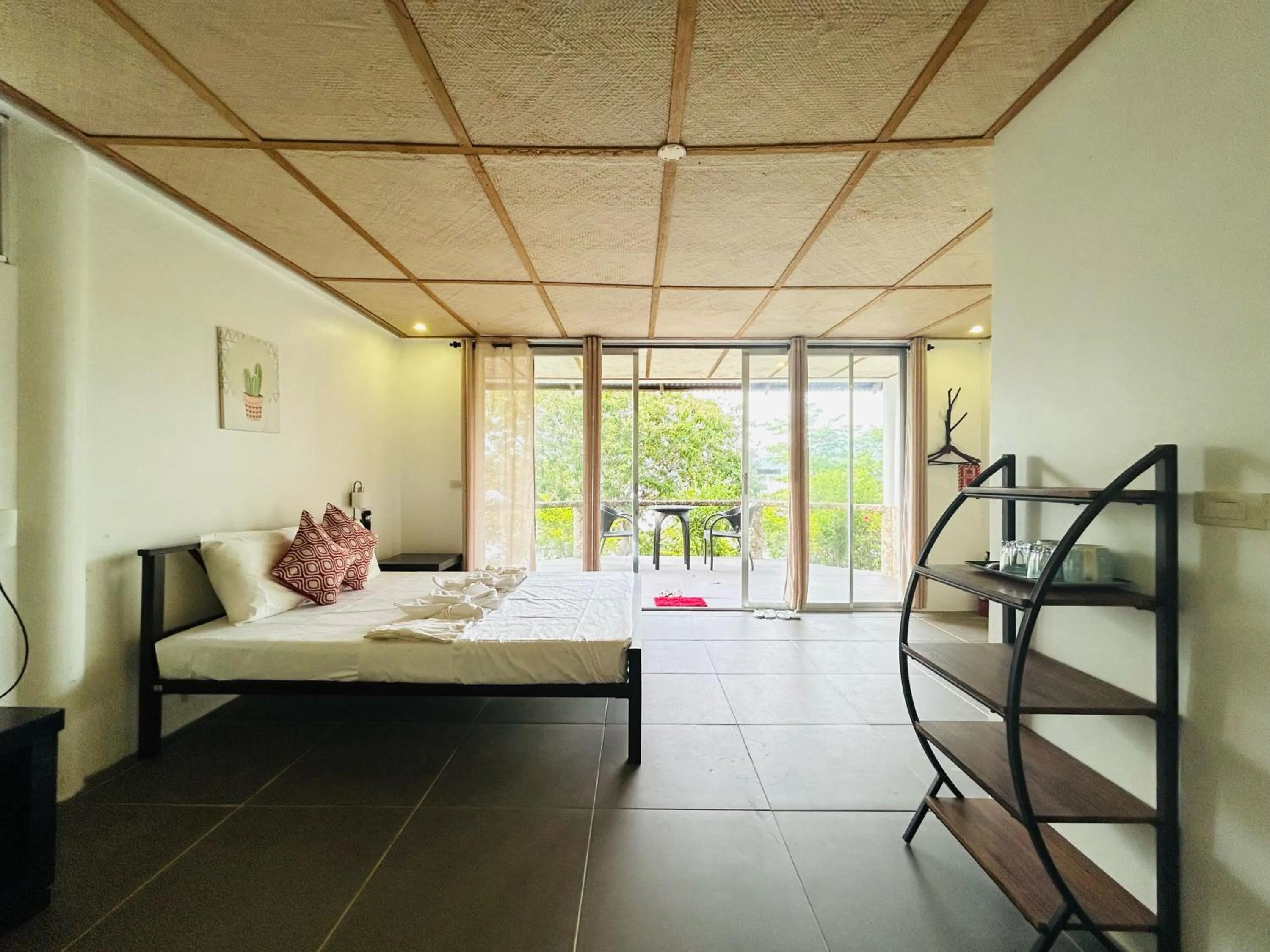 Bed in Chindonan Dive and Beach Resort