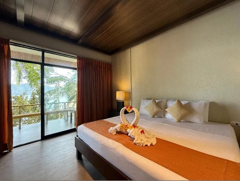 Bed in Chindonan Dive and Beach Resort
