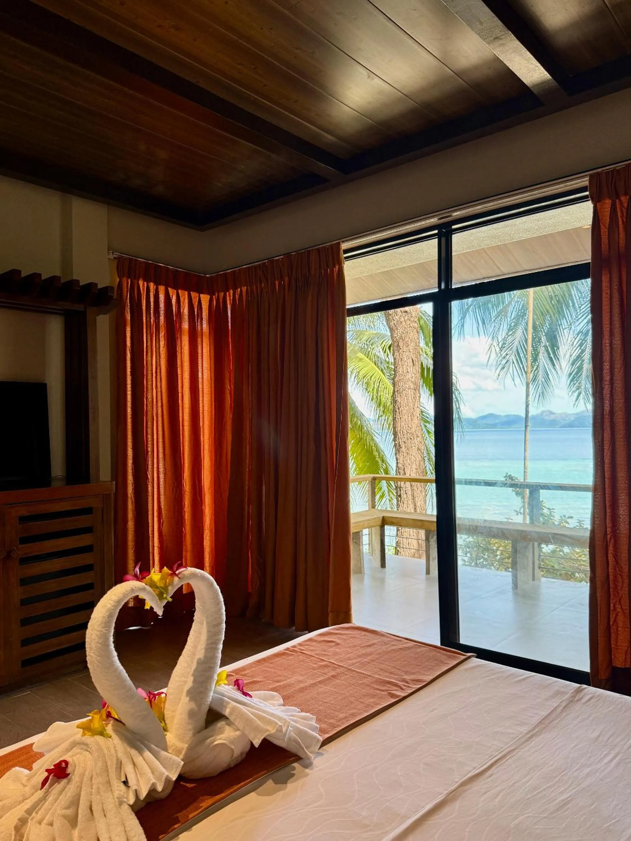 Bed in Chindonan Dive and Beach Resort