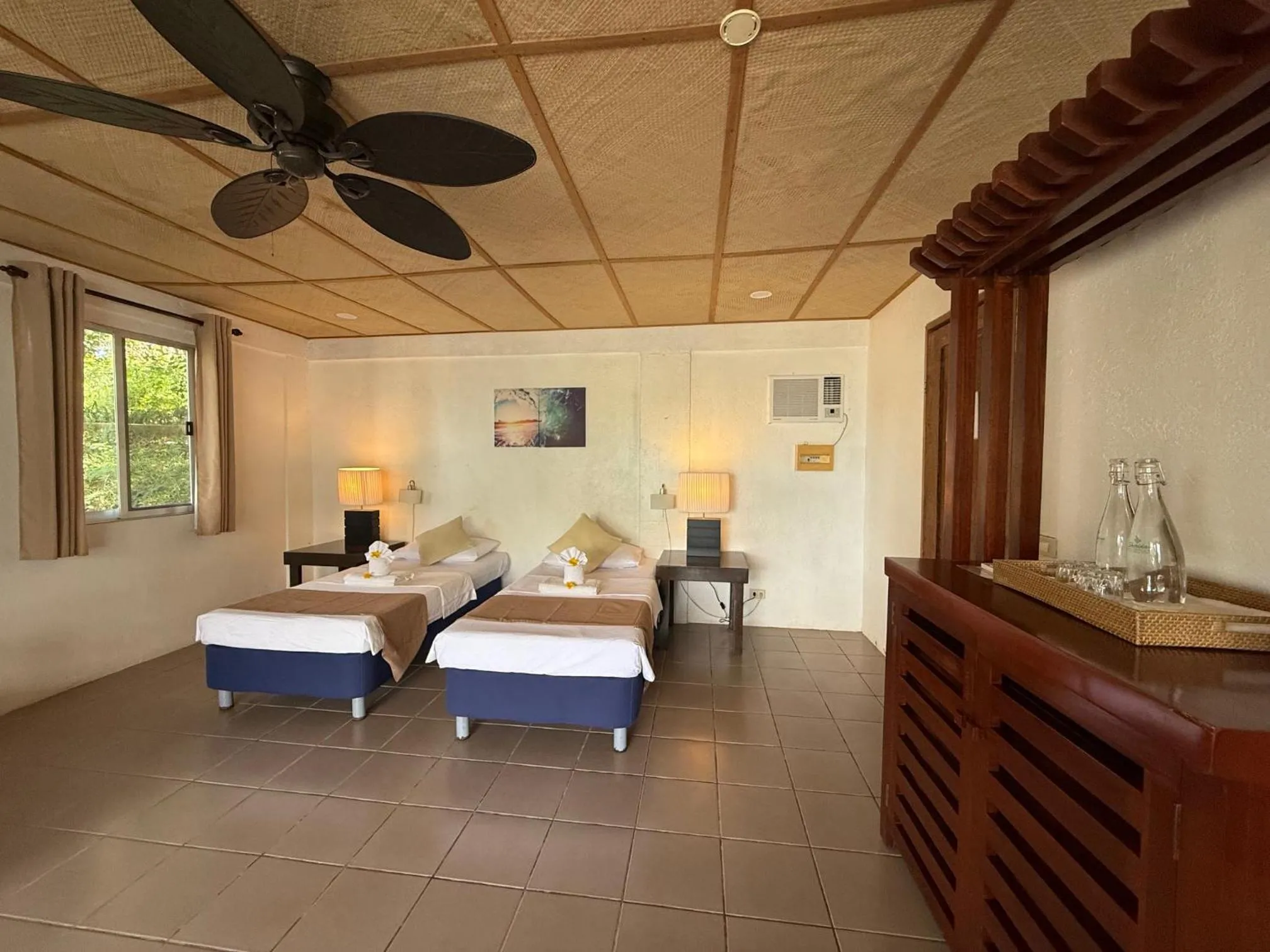 Bed in Chindonan Dive and Beach Resort