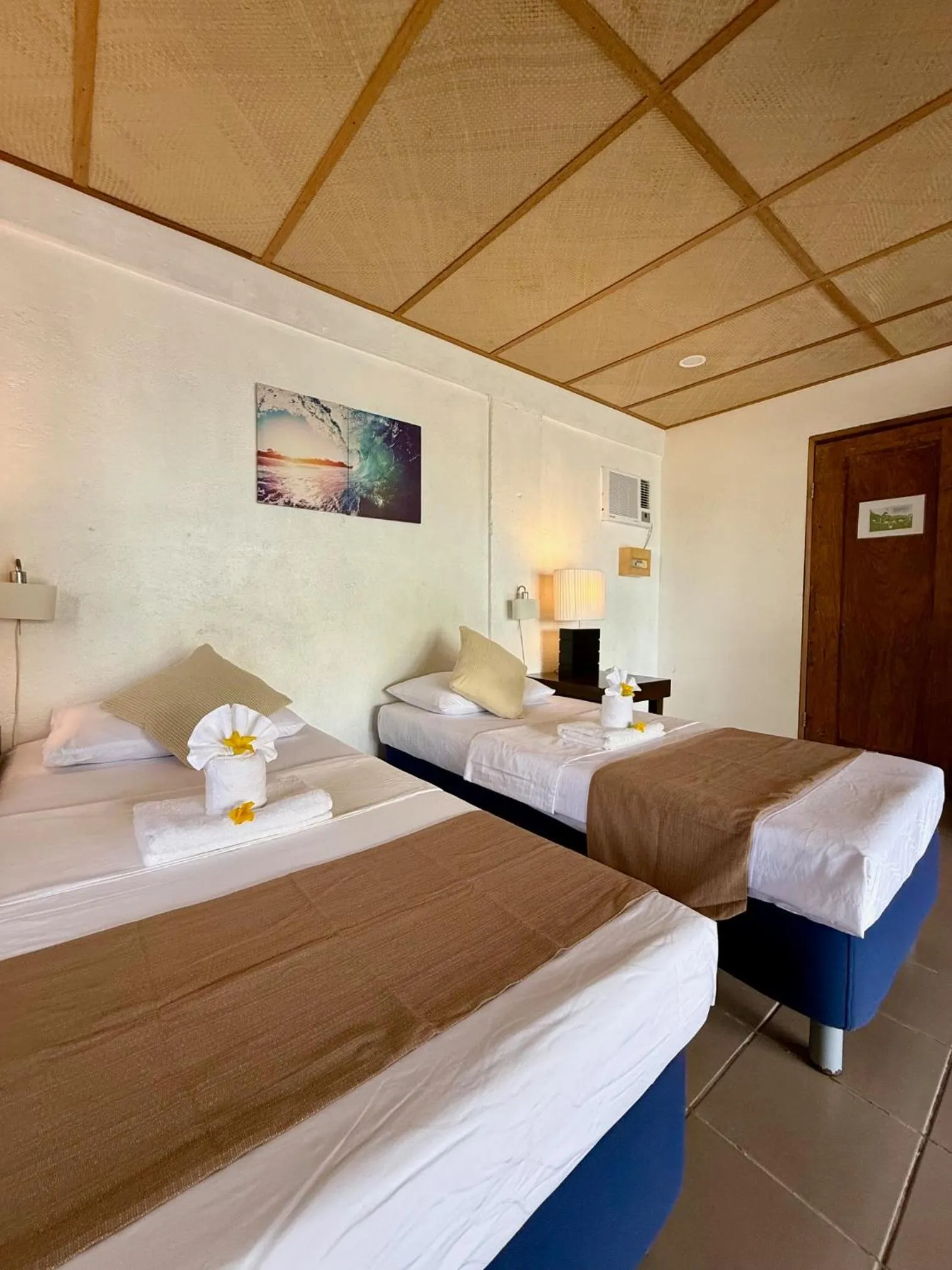 Bed in Chindonan Dive and Beach Resort