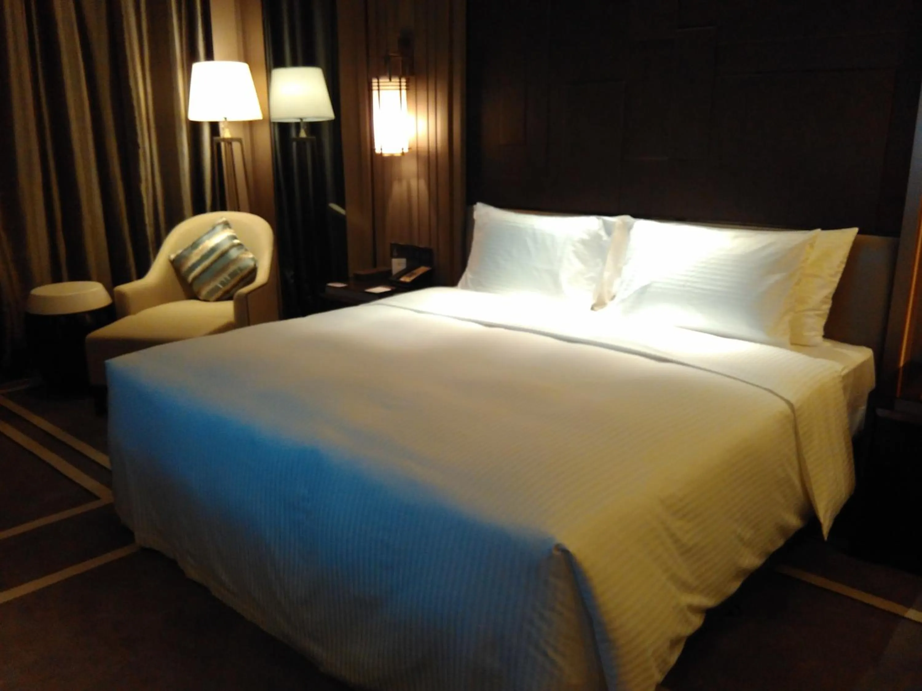 Photo of the whole room, Bed in Wanda Realm Hotel Dongying