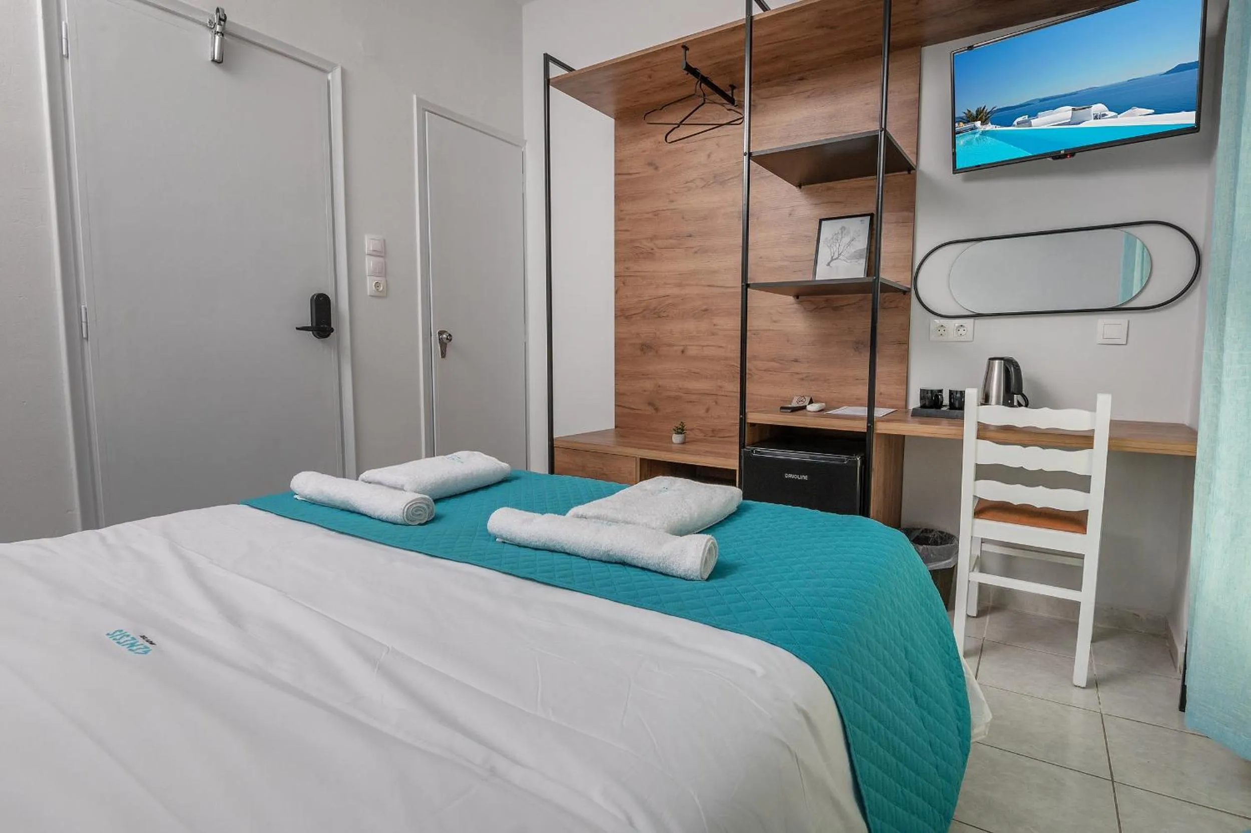 Bed in Genesis Hotel