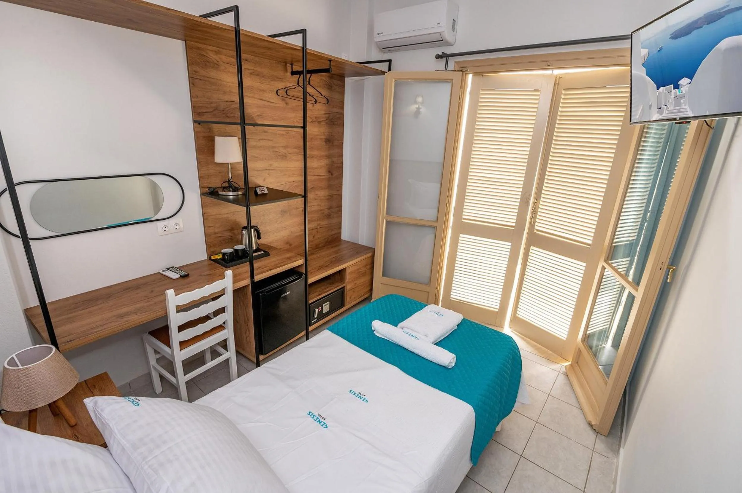 Bedroom in Genesis Hotel