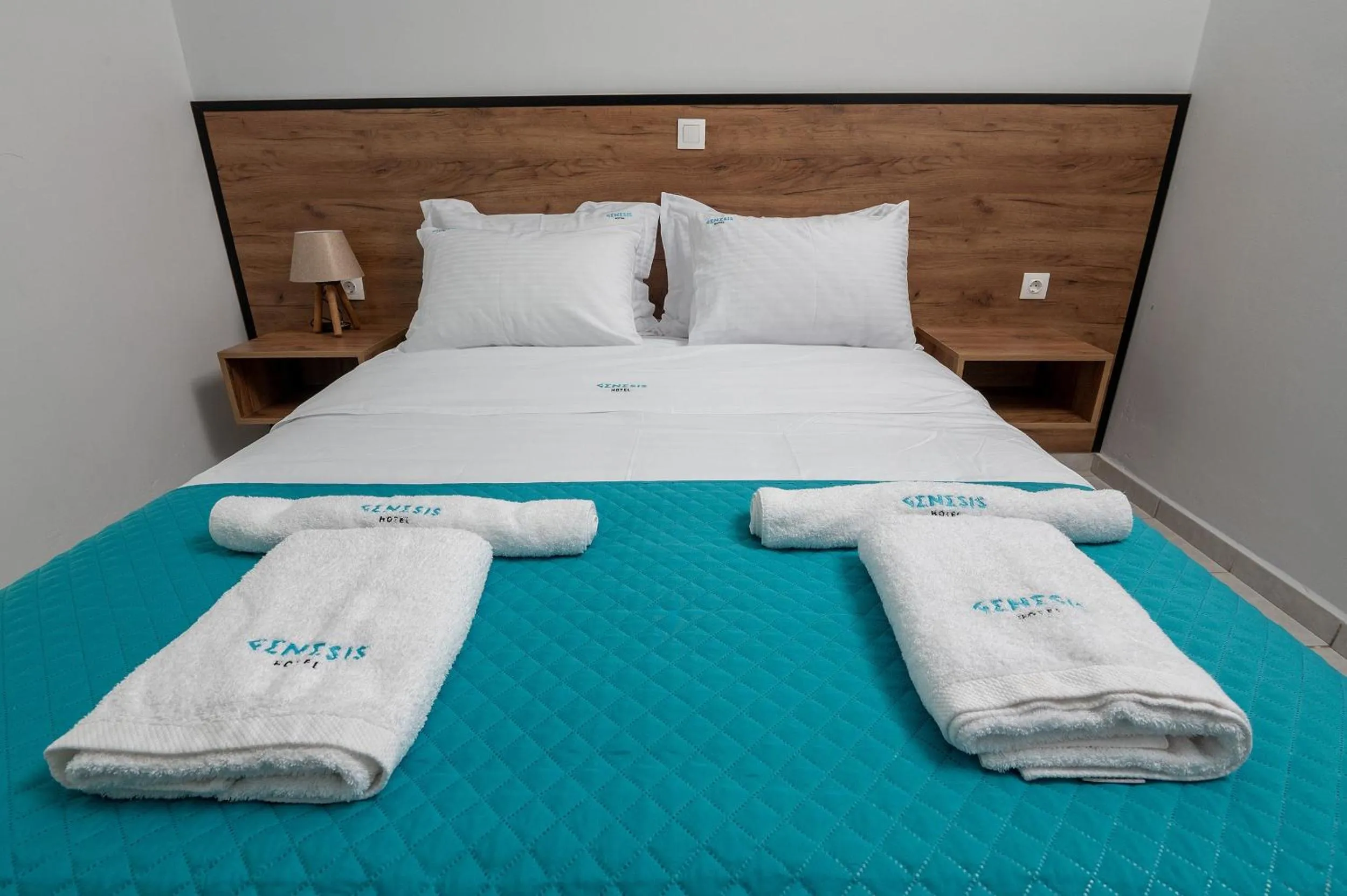 Bed in Genesis Hotel