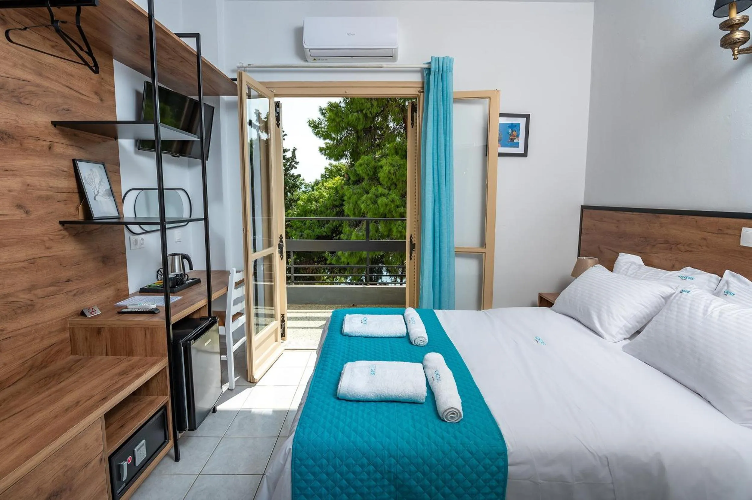 Bed in Genesis Hotel