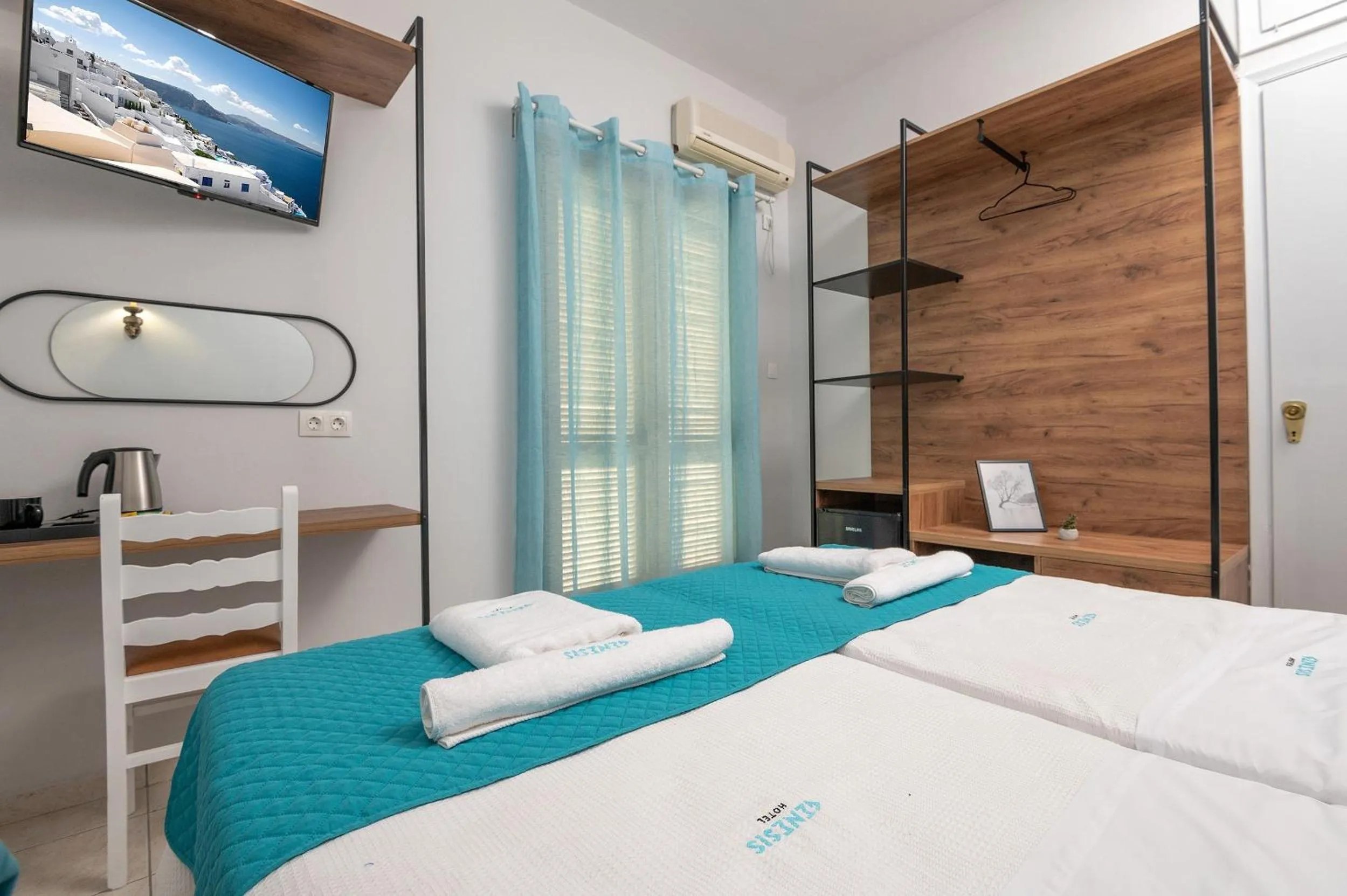 Bed in Genesis Hotel