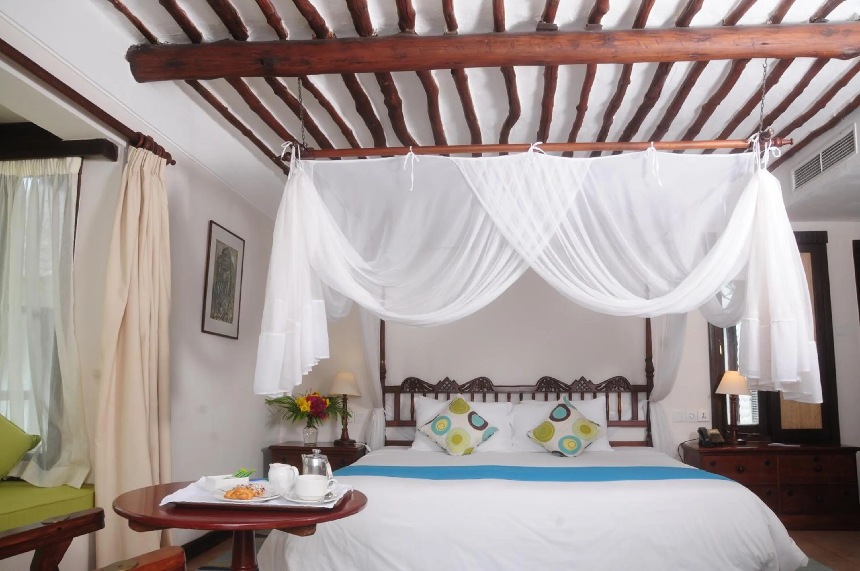 Photo of the whole room, Bed in Jacaranda Indian Ocean Beach Resort