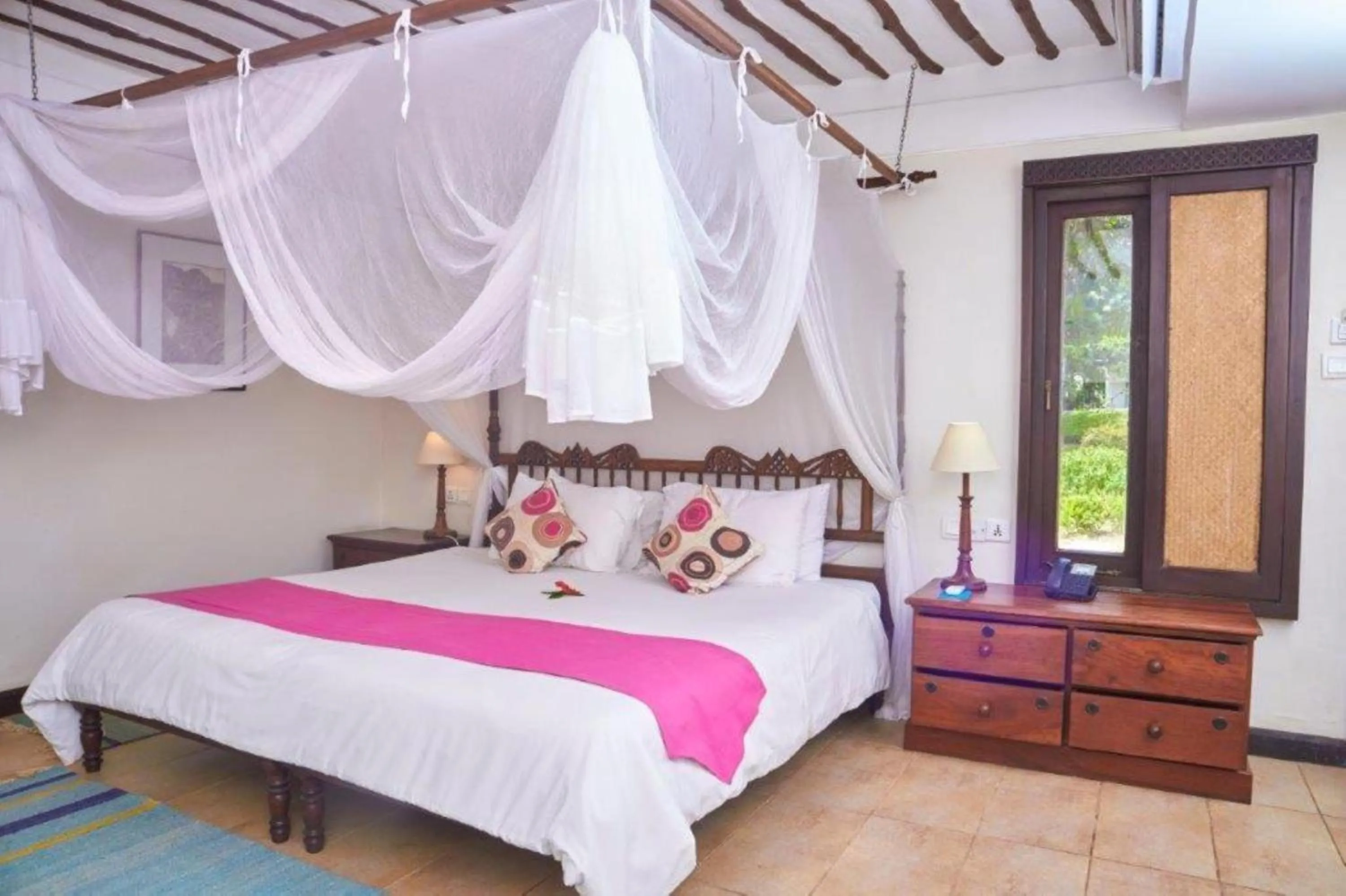 Bed in Jacaranda Indian Ocean Beach Resort