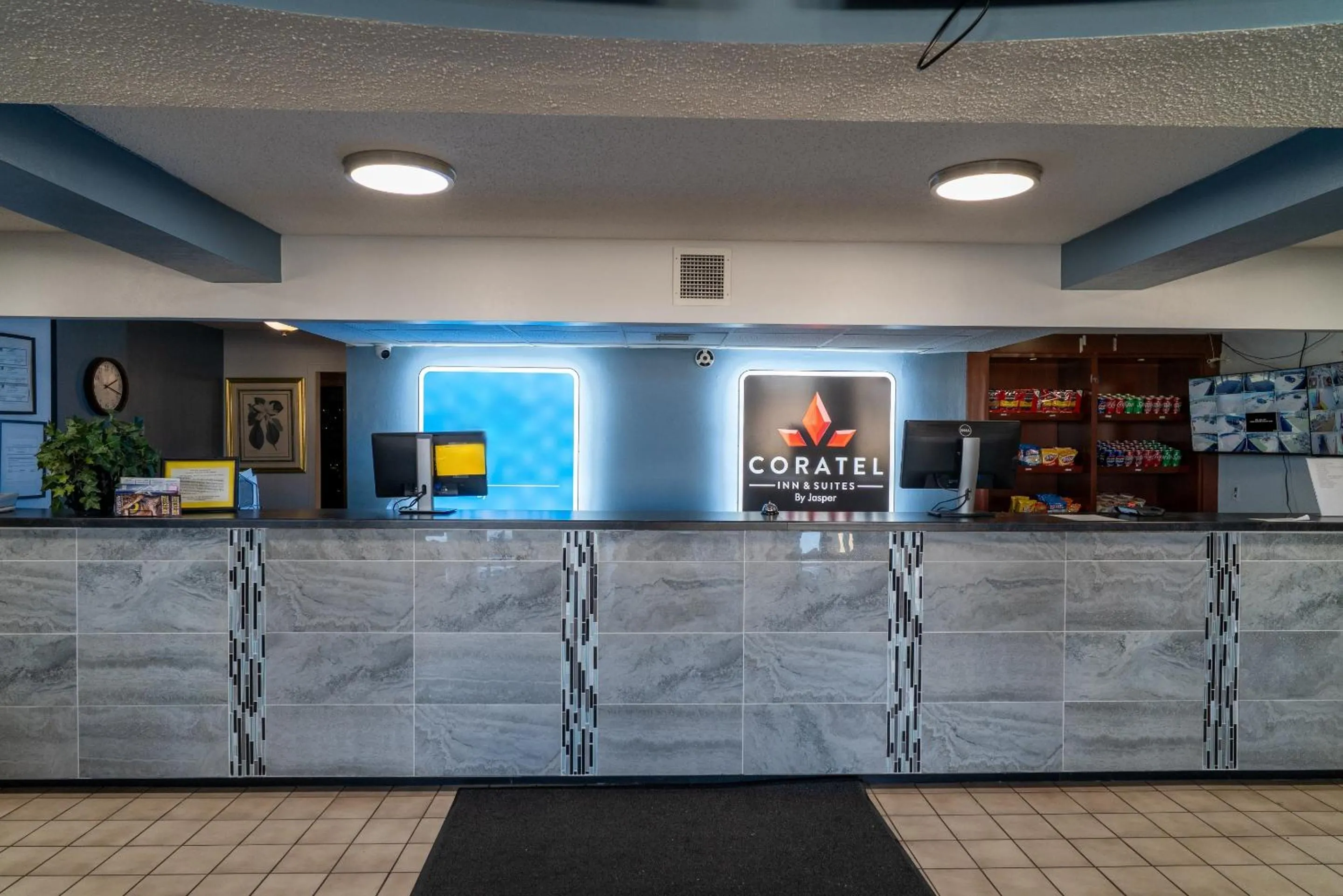 Property logo or sign in Coratel Inn and Suites By Jasper Lacrosse