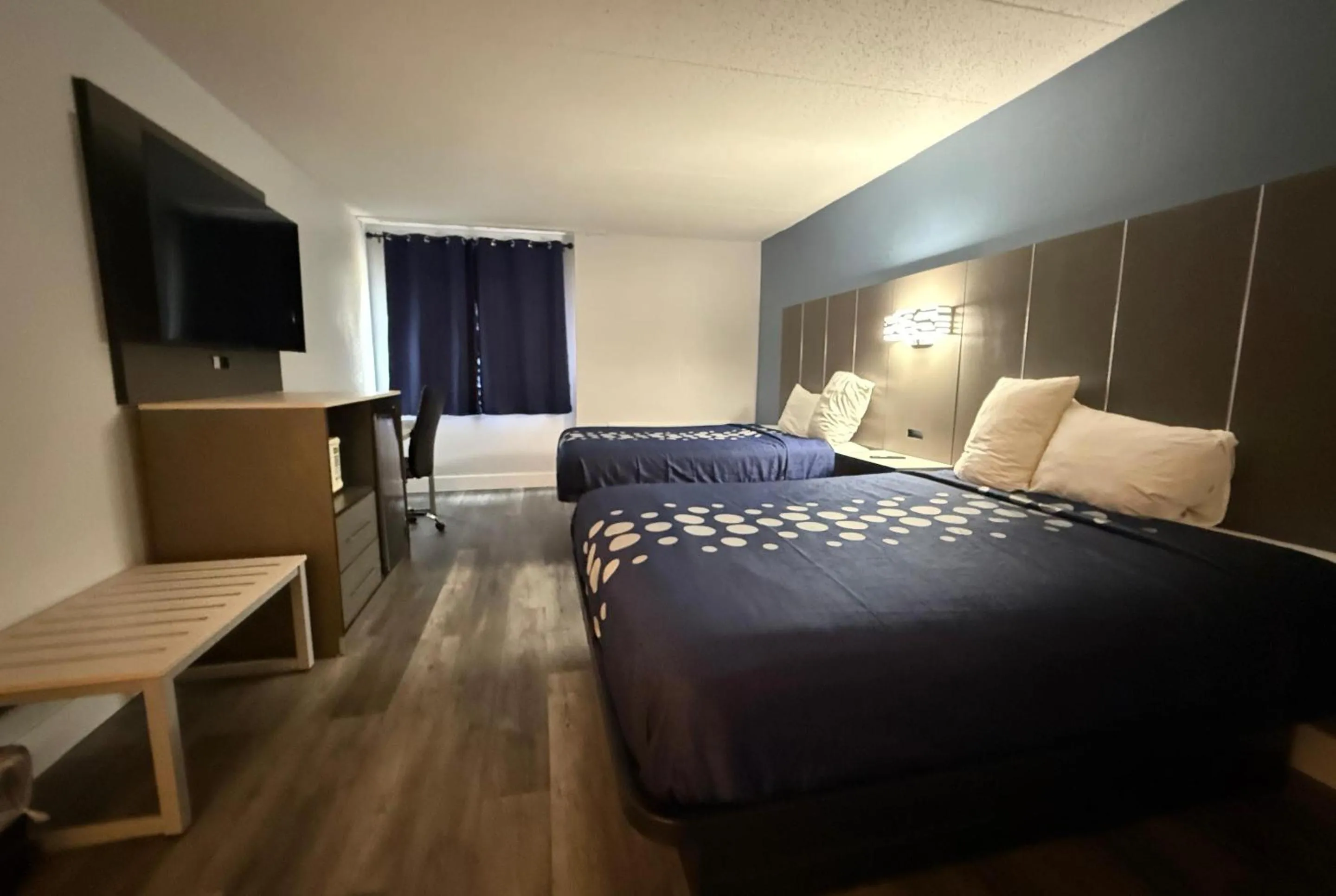 Bed in Coratel Inn and Suites By Jasper Lacrosse
