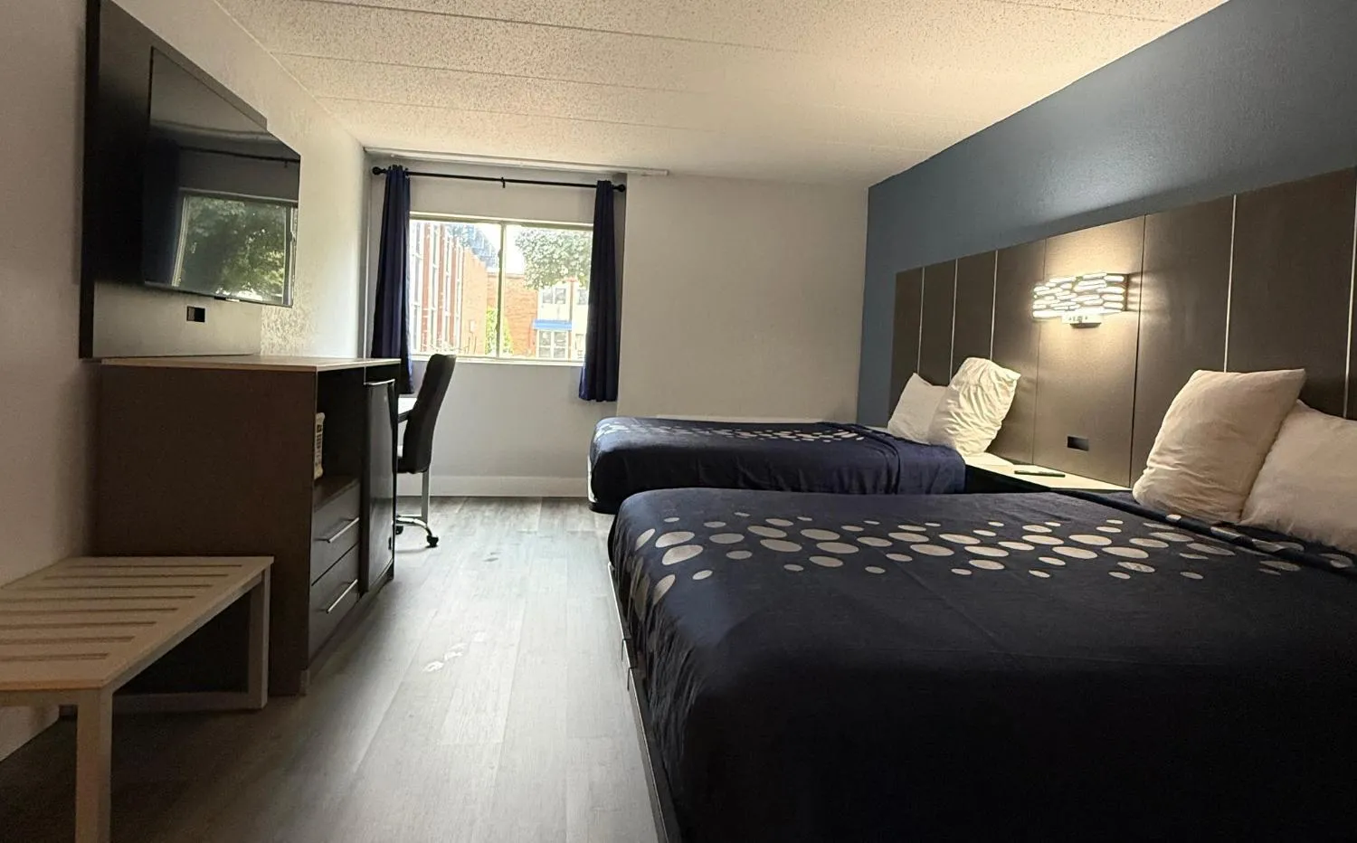Bed in Coratel Inn and Suites By Jasper Lacrosse