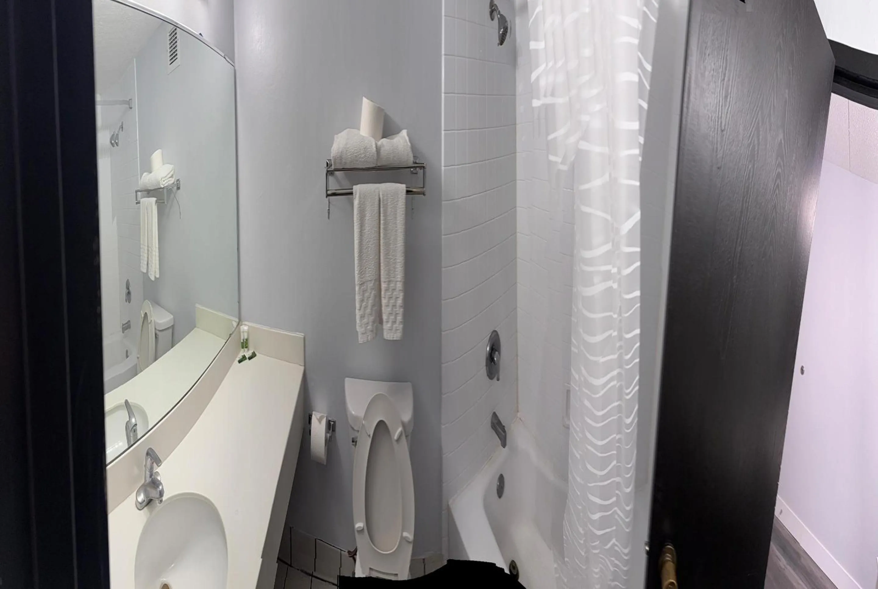 Shower in Coratel Inn and Suites By Jasper Lacrosse