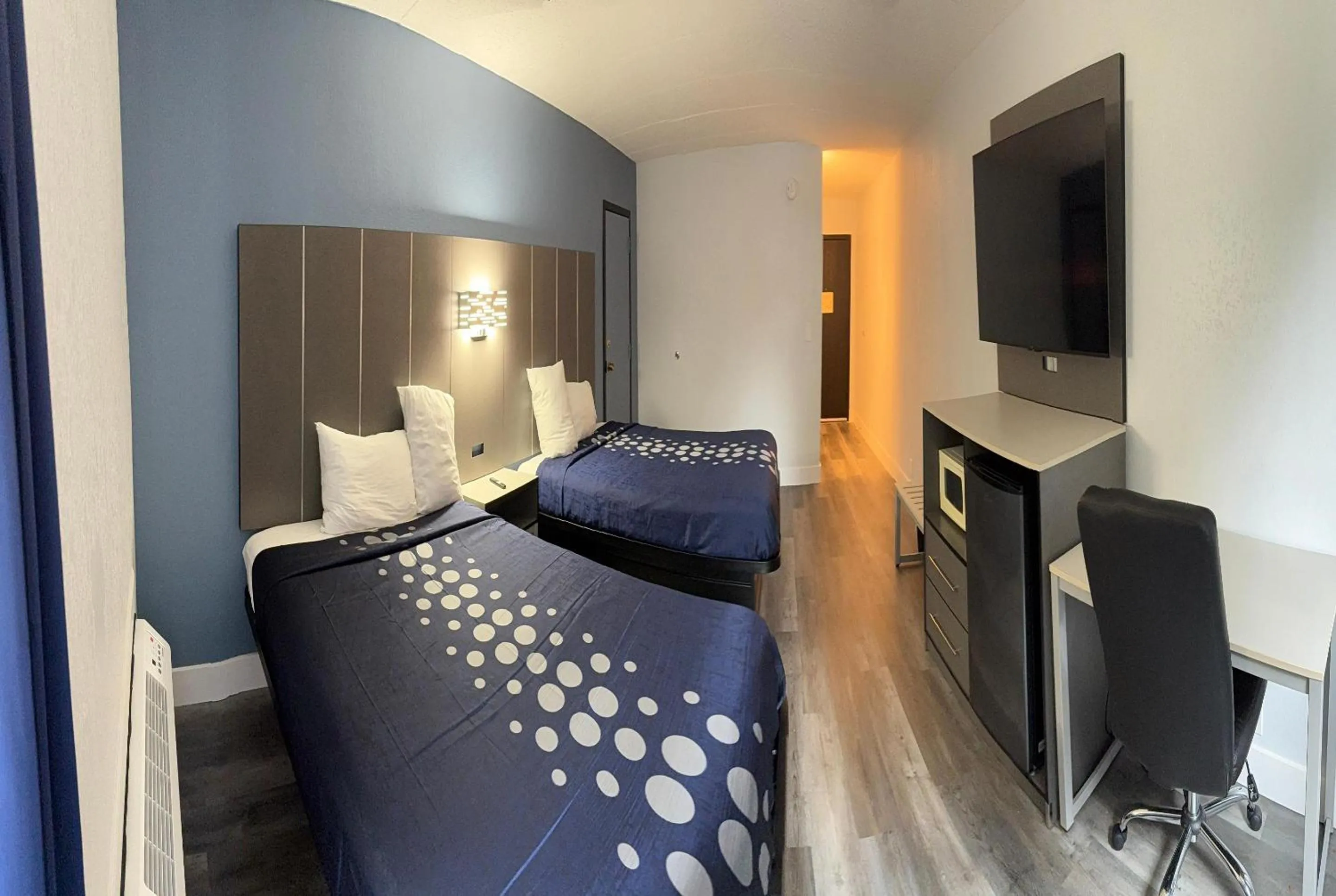 Bedroom, Bed in Coratel Inn and Suites By Jasper Lacrosse