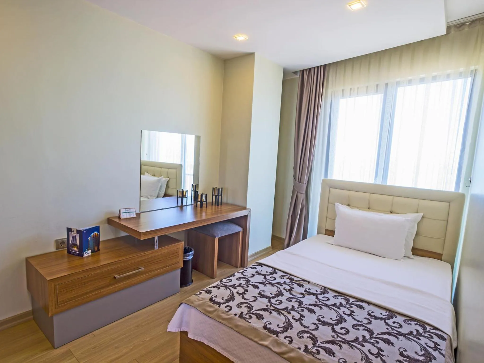 Bed in Alesha Suite Otel