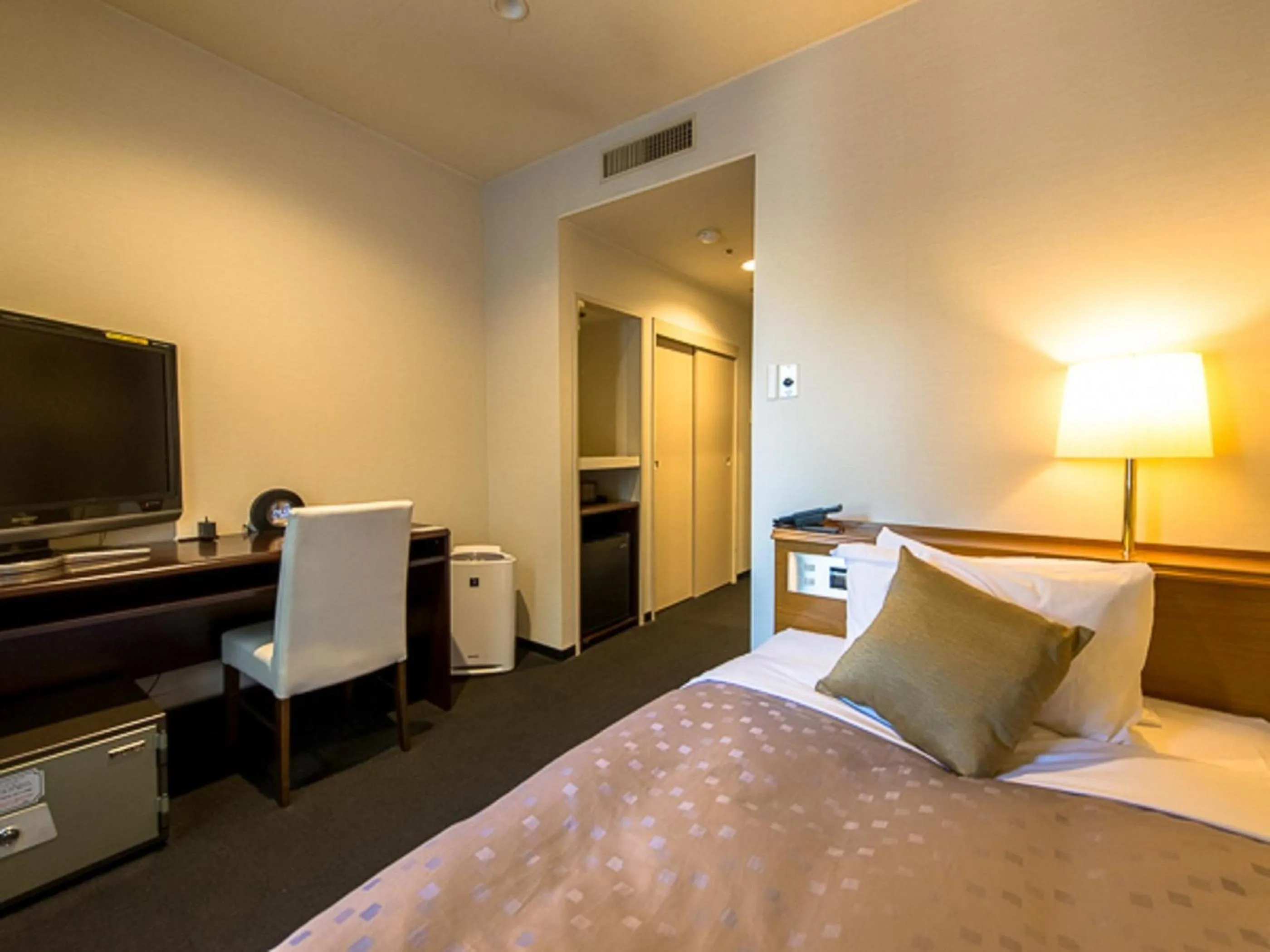 Bed in LiVEMAX RESORT Kaga Yamashiro