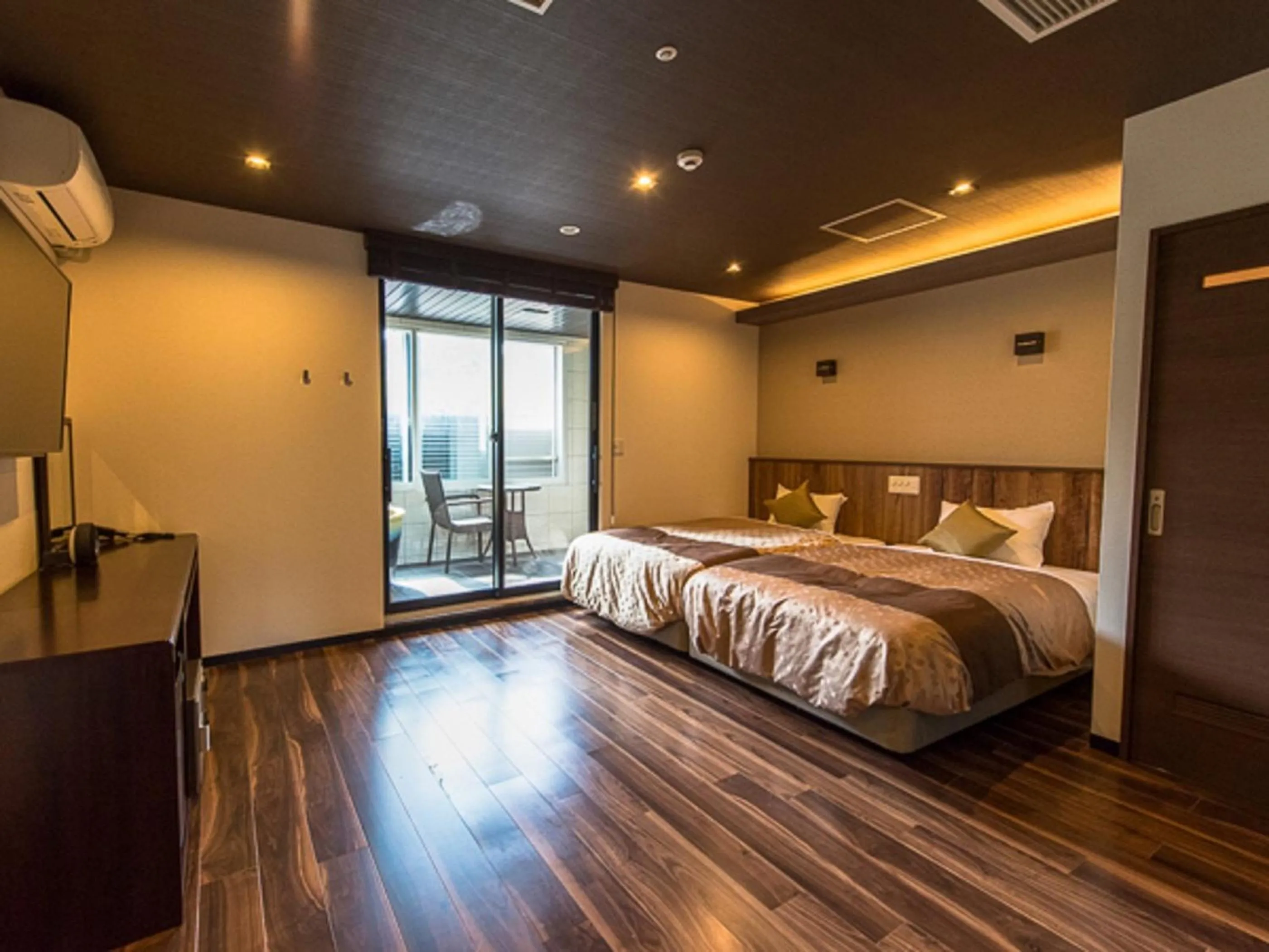 Bed in LiVEMAX RESORT Kaga Yamashiro