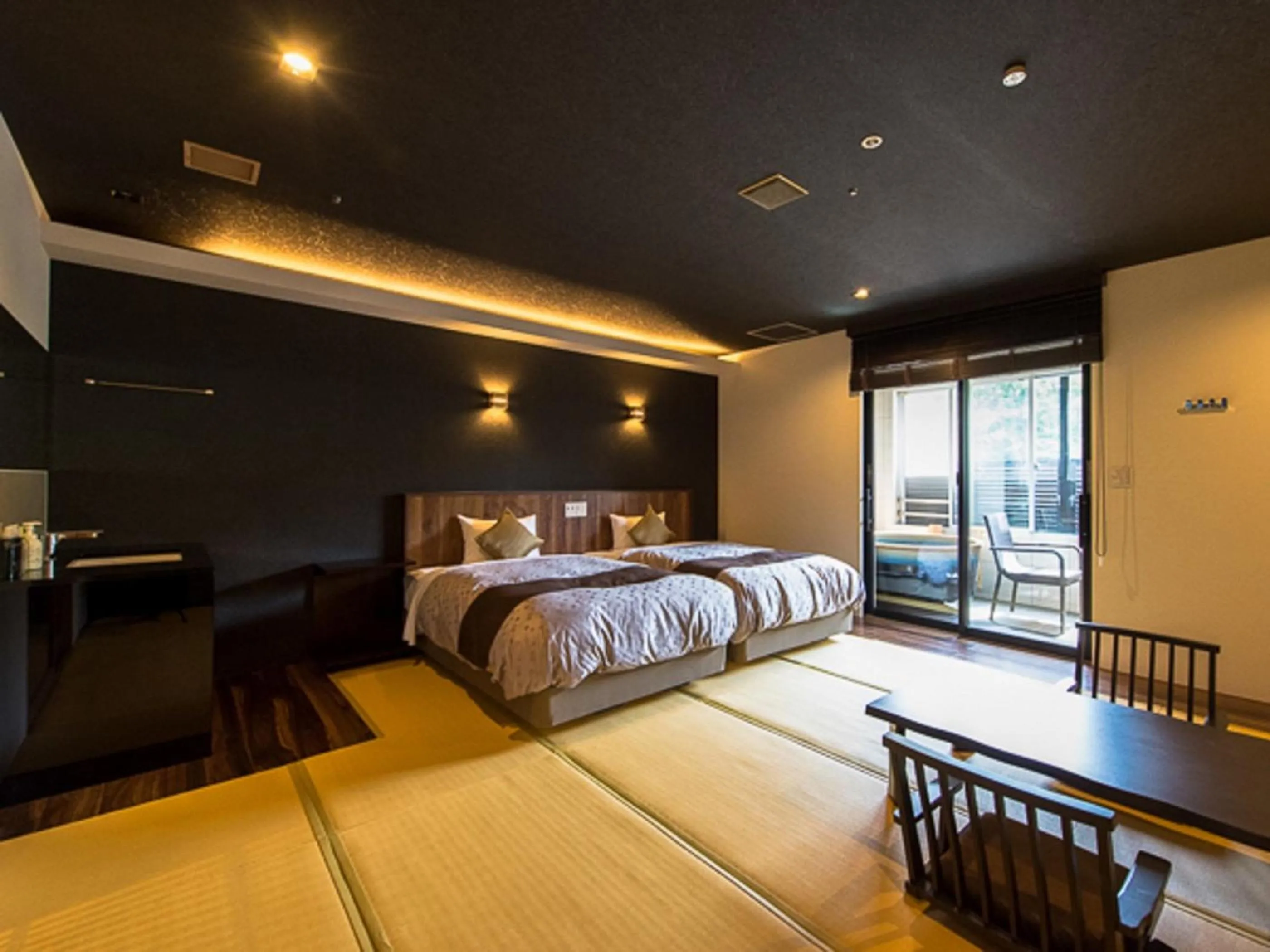 Bed in LiVEMAX RESORT Kaga Yamashiro
