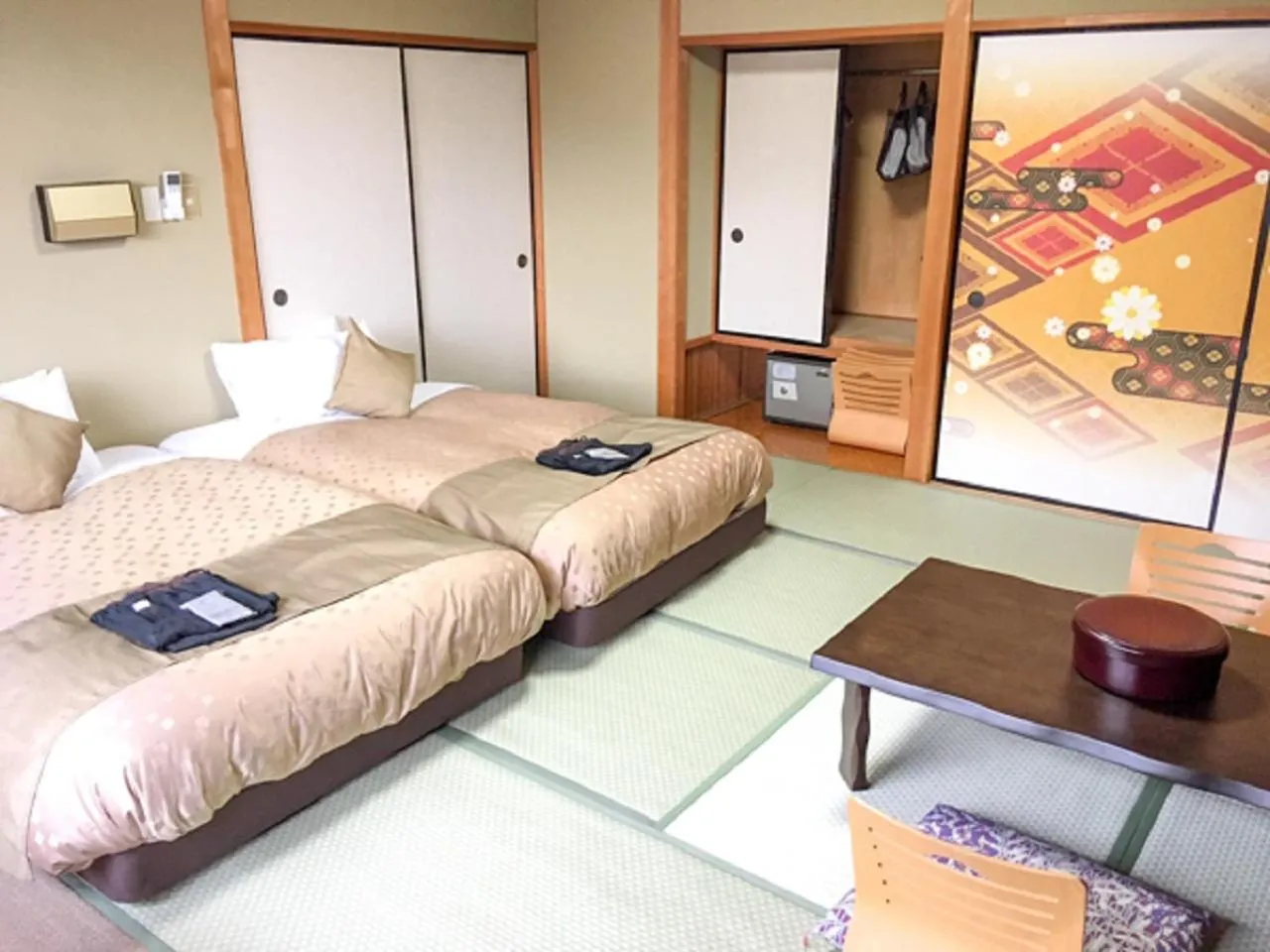 Bed in LiVEMAX RESORT Kaga Yamashiro