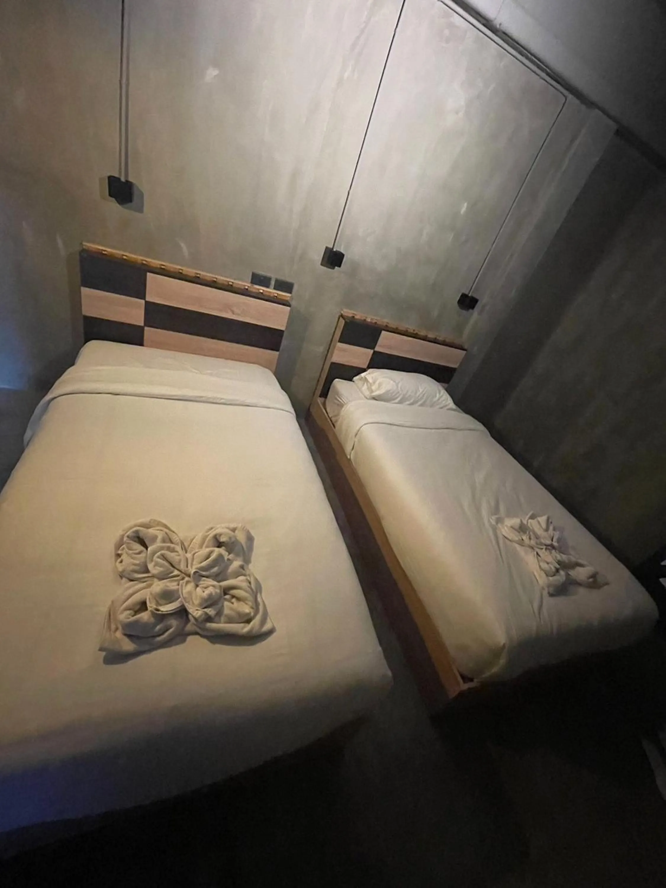 Bed in Sukhum Rajamangala-Phatthanakan Rooms