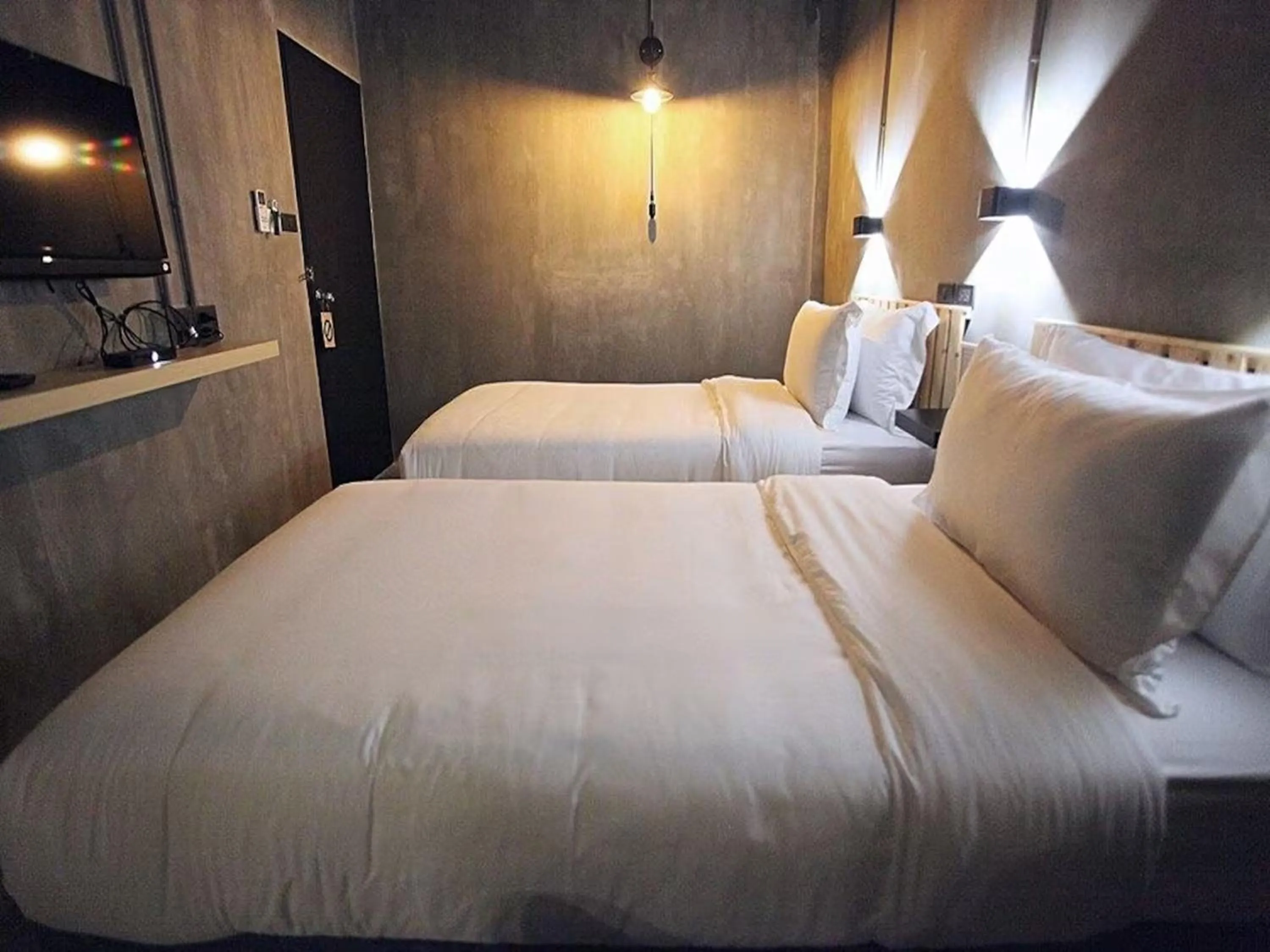 Bed in Sukhum Rajamangala-Phatthanakan Rooms