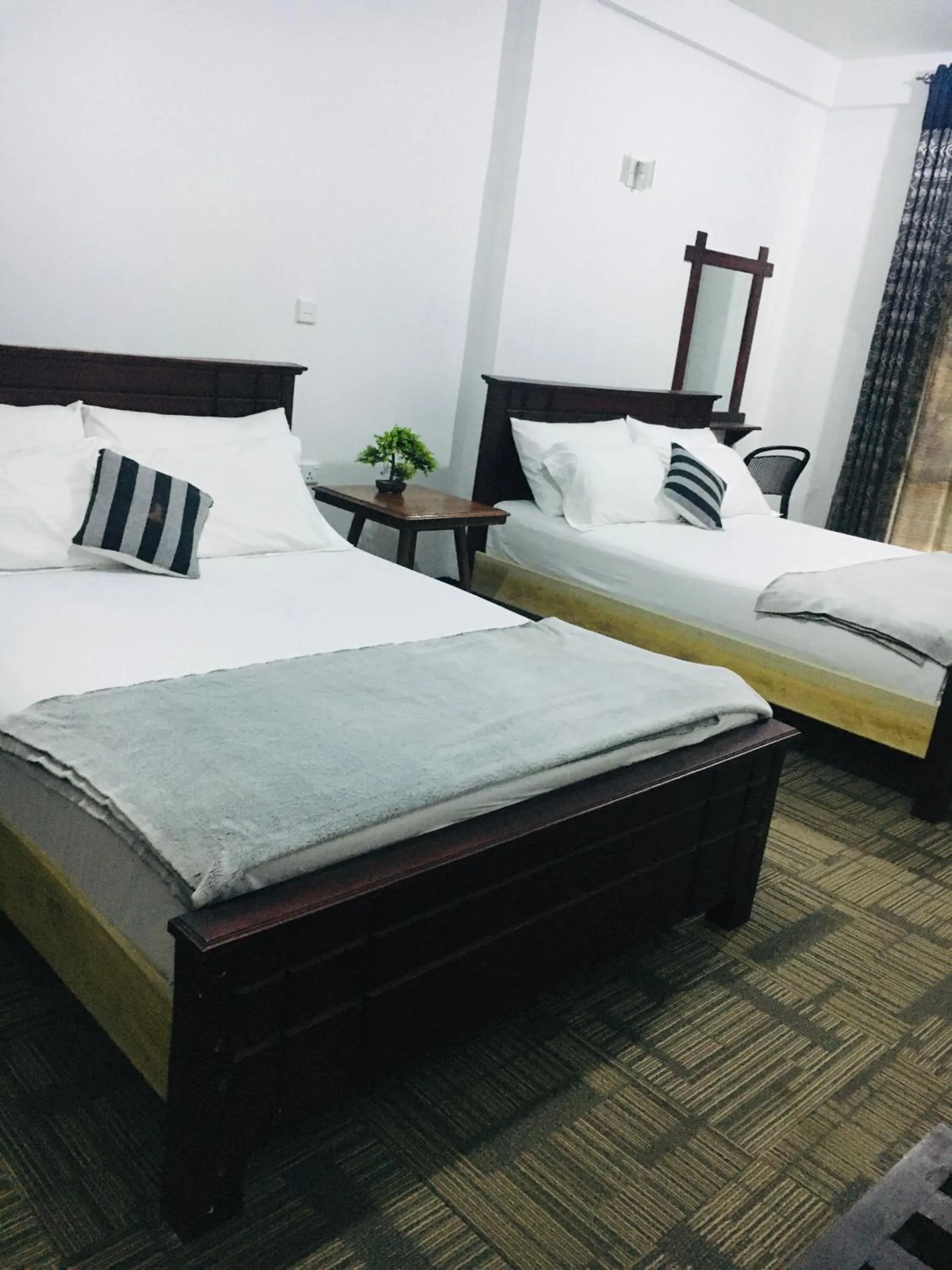 Photo of the whole room, Bed in Ella Rock Land