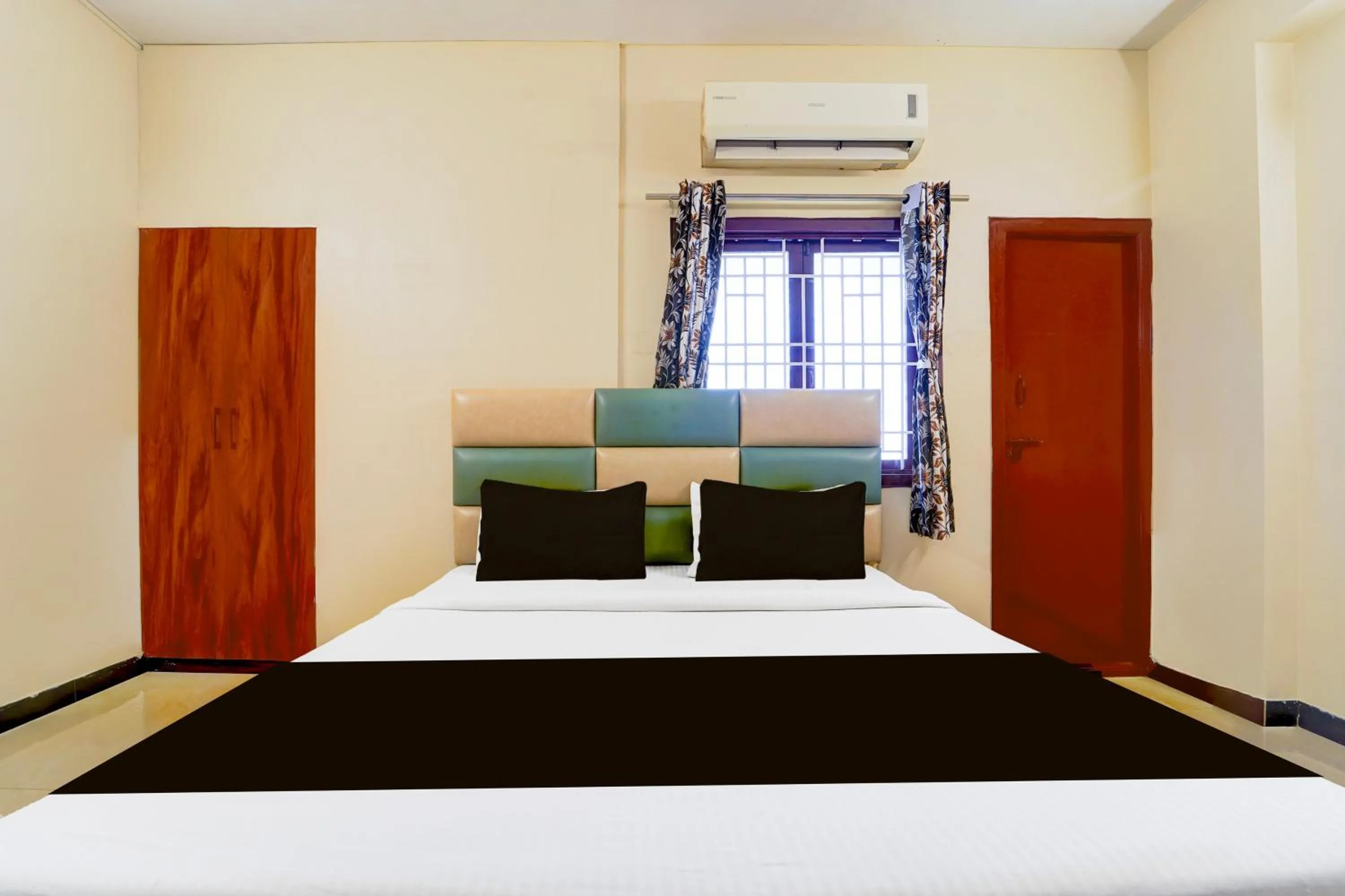 Bedroom in Hotel O Singanallur Railway Junction Formerly 2D Residency