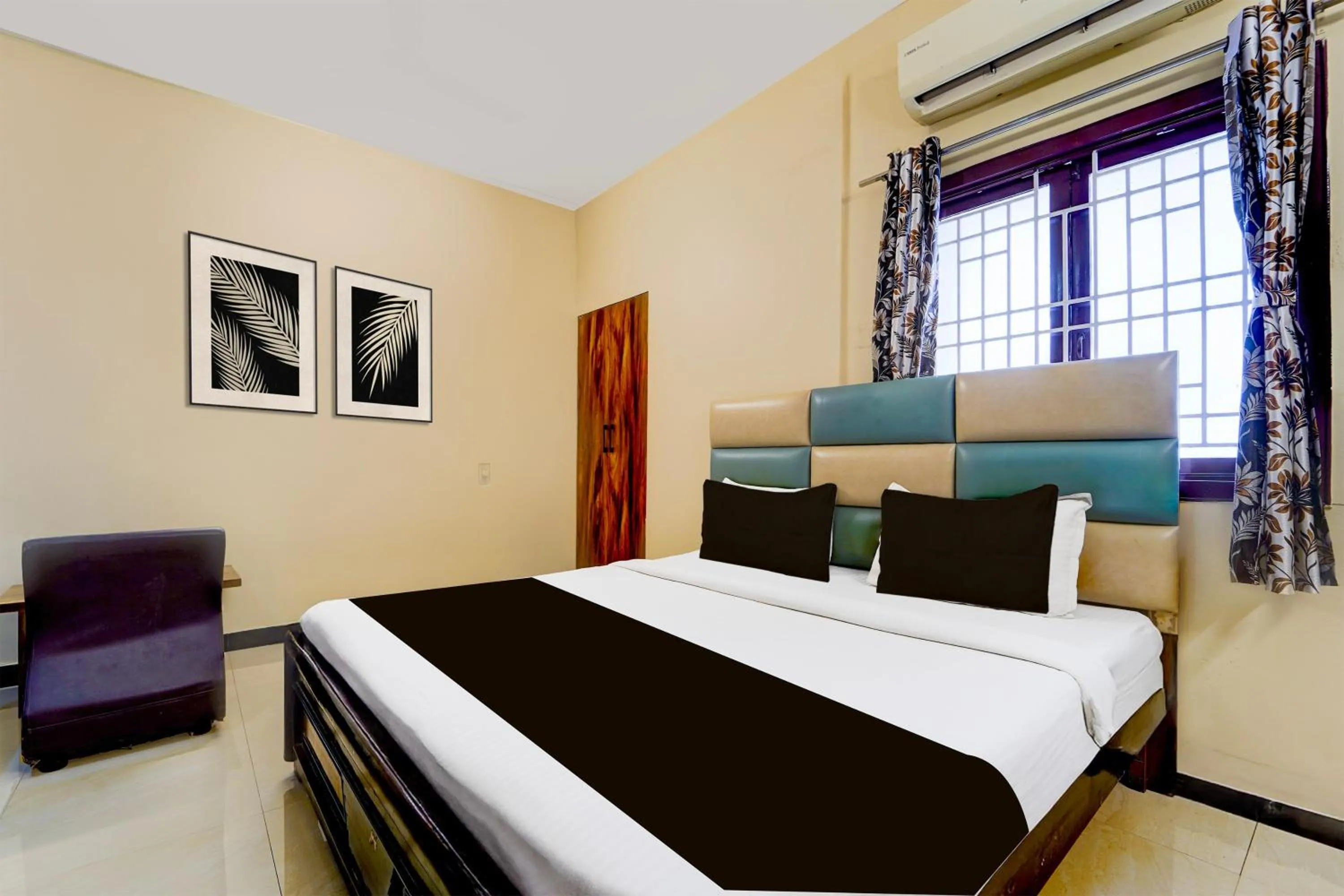 Bedroom in Hotel O Singanallur Railway Junction Formerly 2D Residency