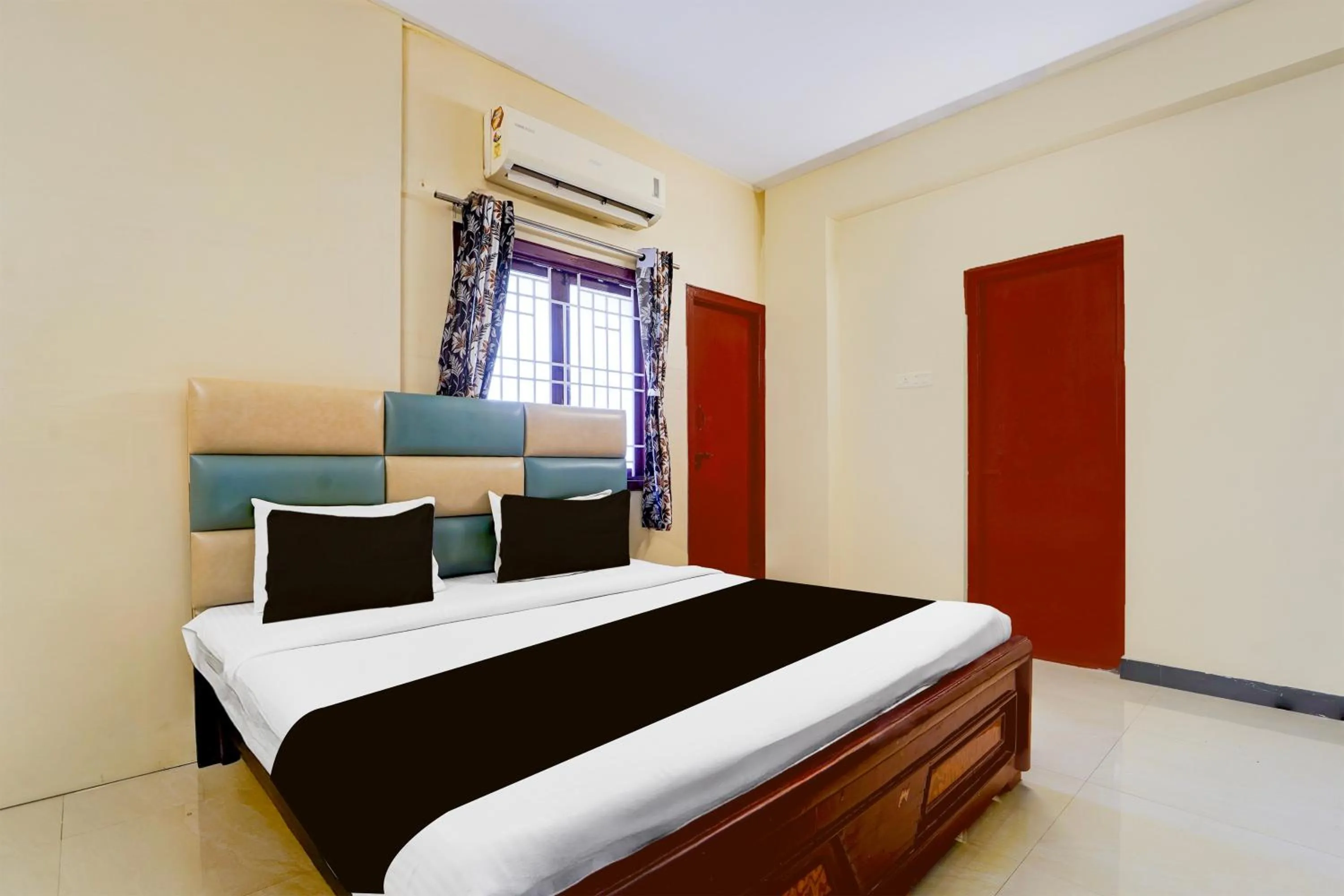 Bedroom in Hotel O Singanallur Railway Junction Formerly 2D Residency